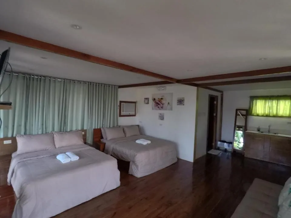 Bed in Descanso En Paraiso Resort