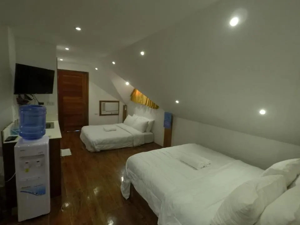 Bed in Descanso En Paraiso Resort