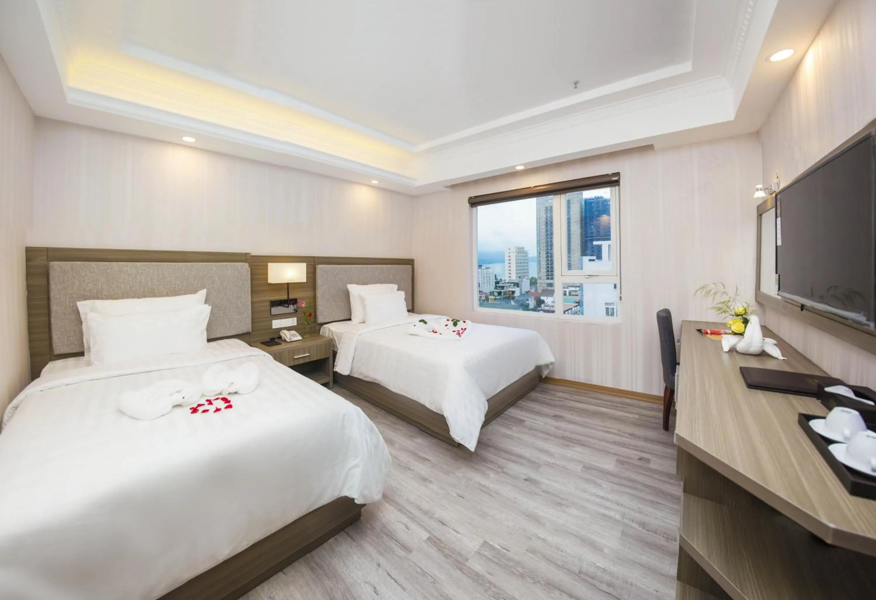 Bed in Golden Rose Hotel