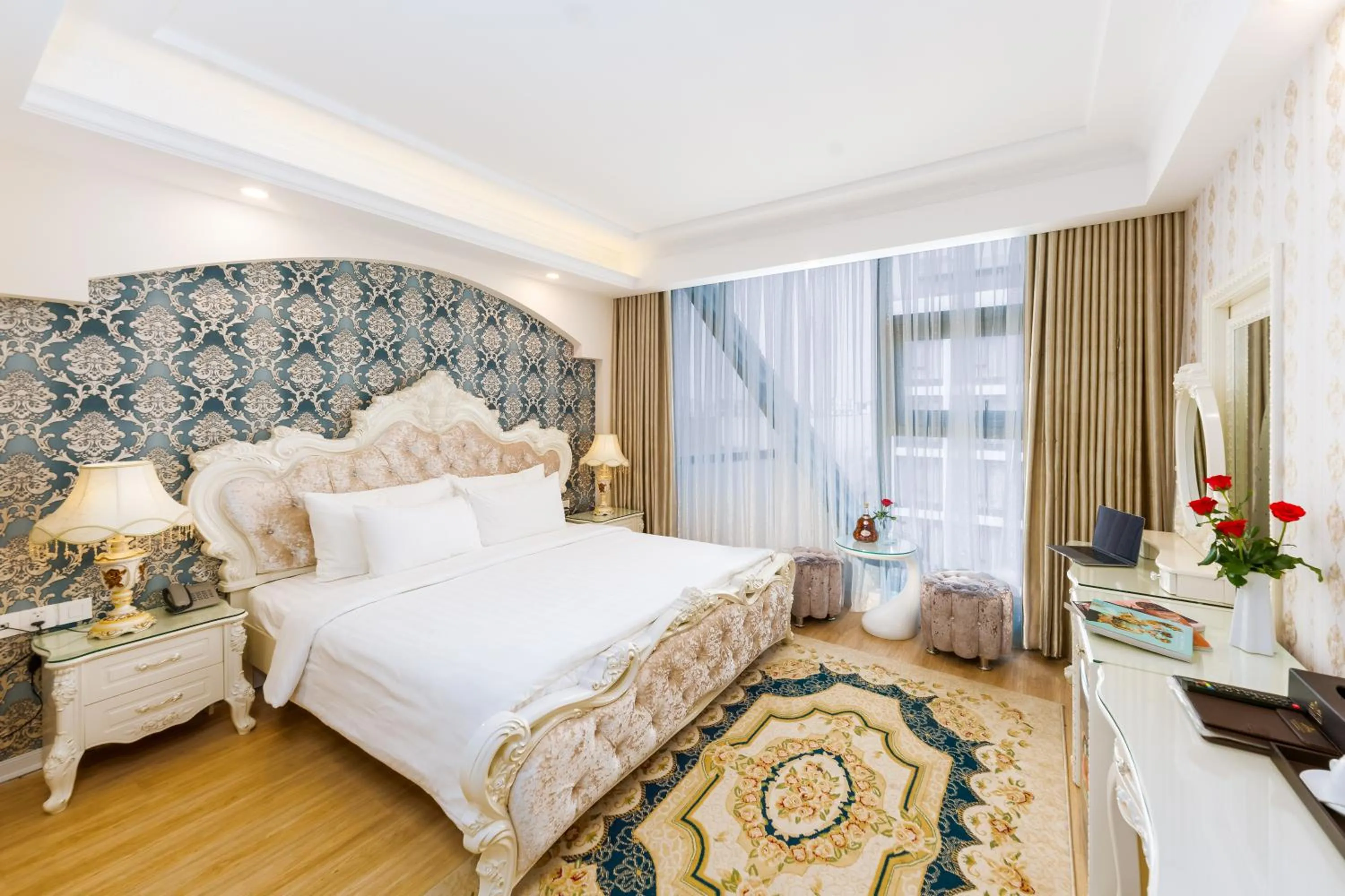 Bed in Golden Rose Hotel