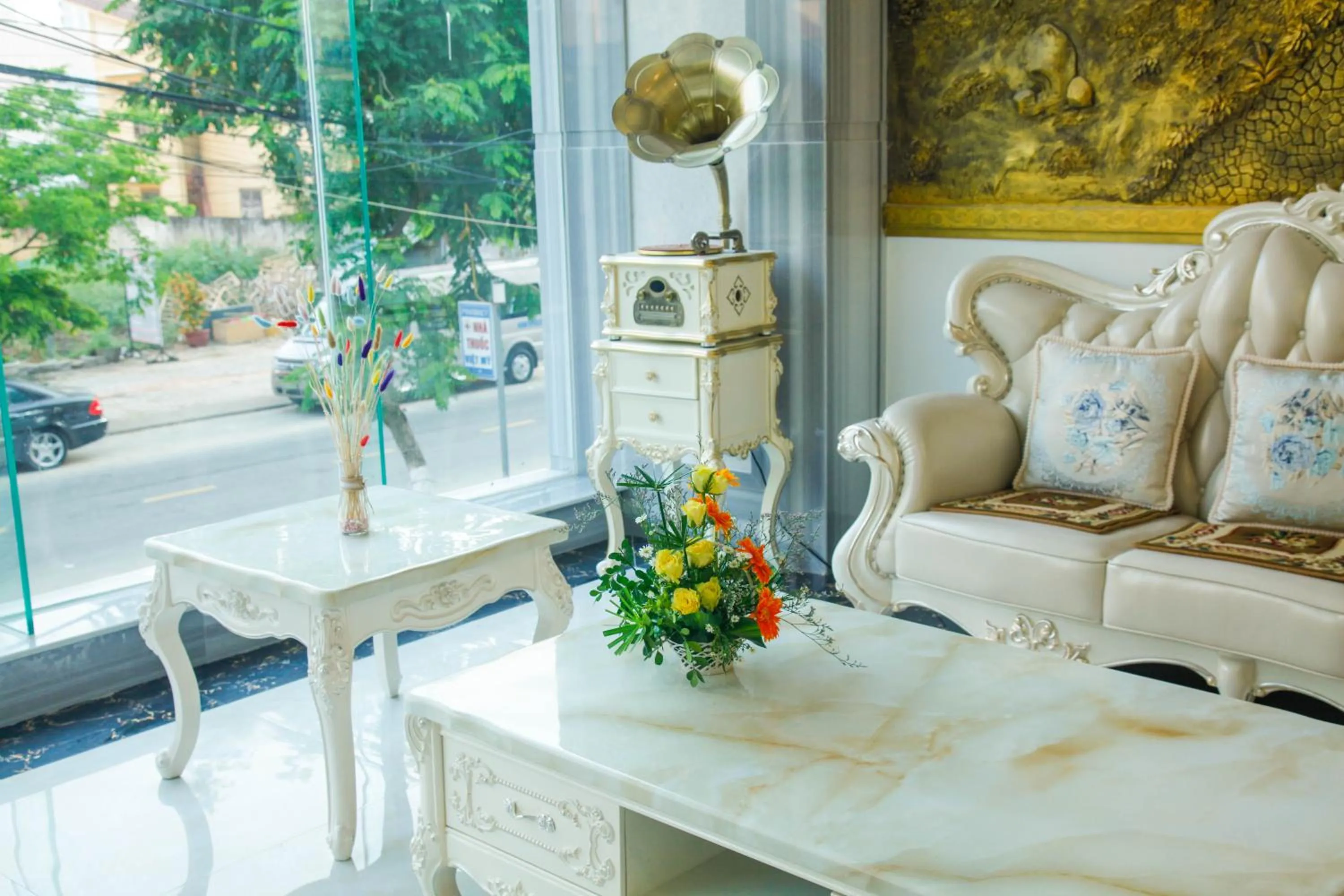 Communal lounge/ TV room in Golden Rose Hotel