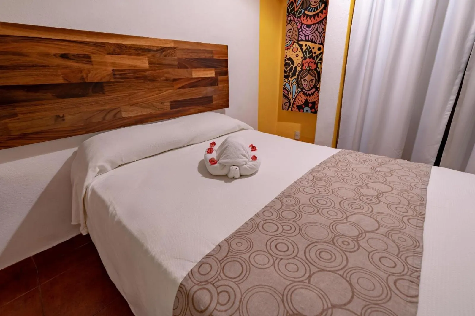 Bed in Hotel Santa Cruz Huatulco