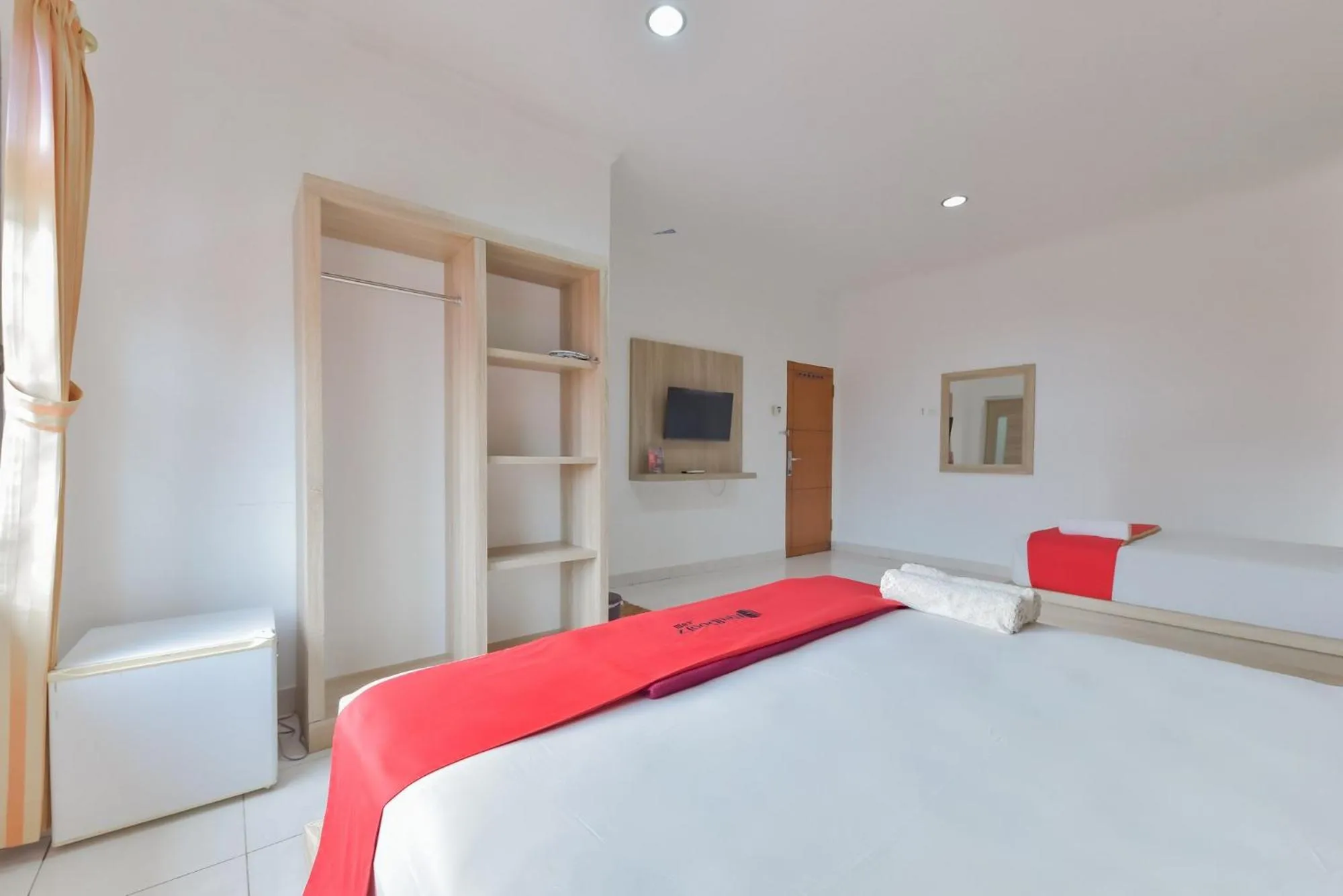 Bed in RedDoorz Syariah near Taman Bekapai 2
