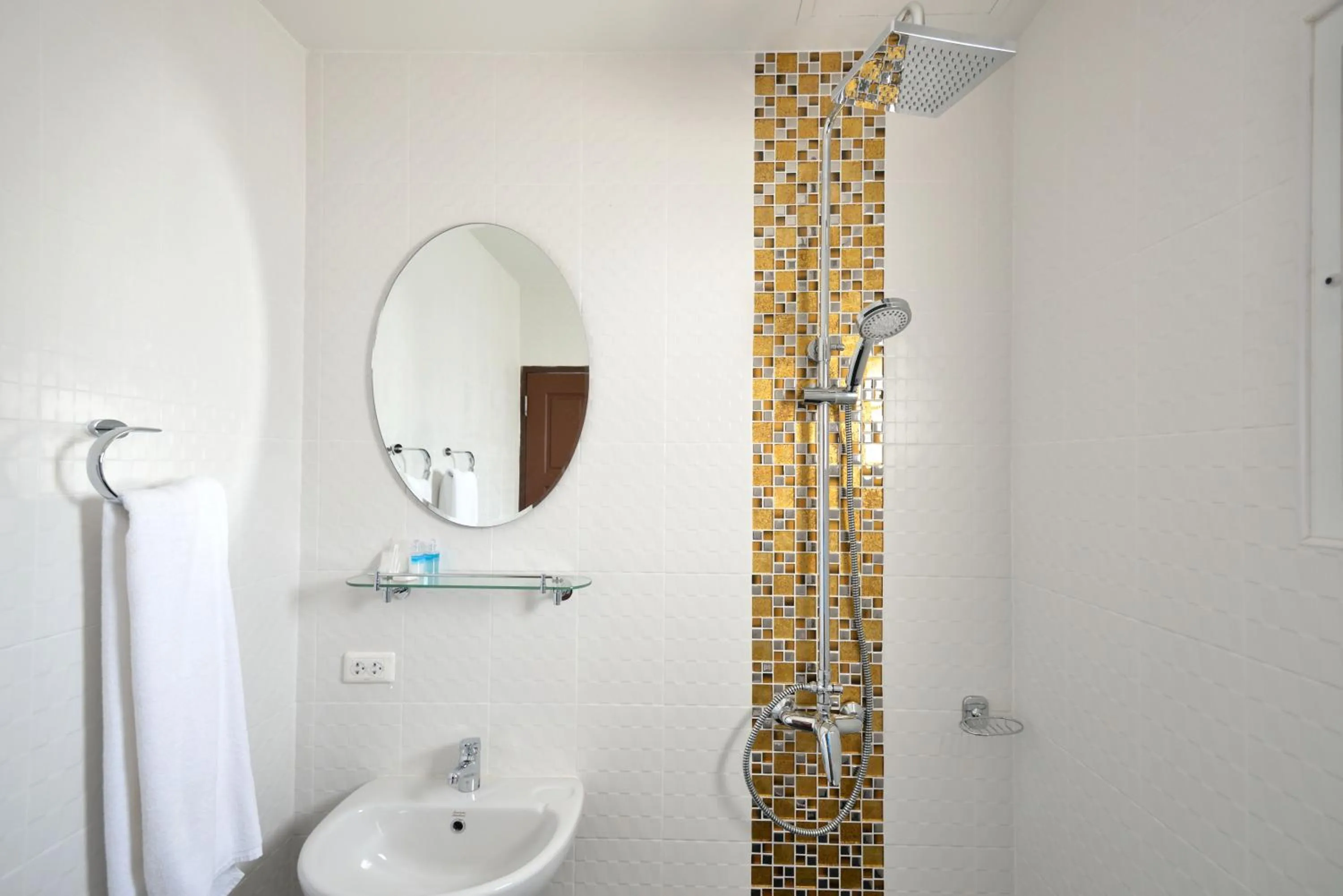 Bathroom in At Kamala Hotel