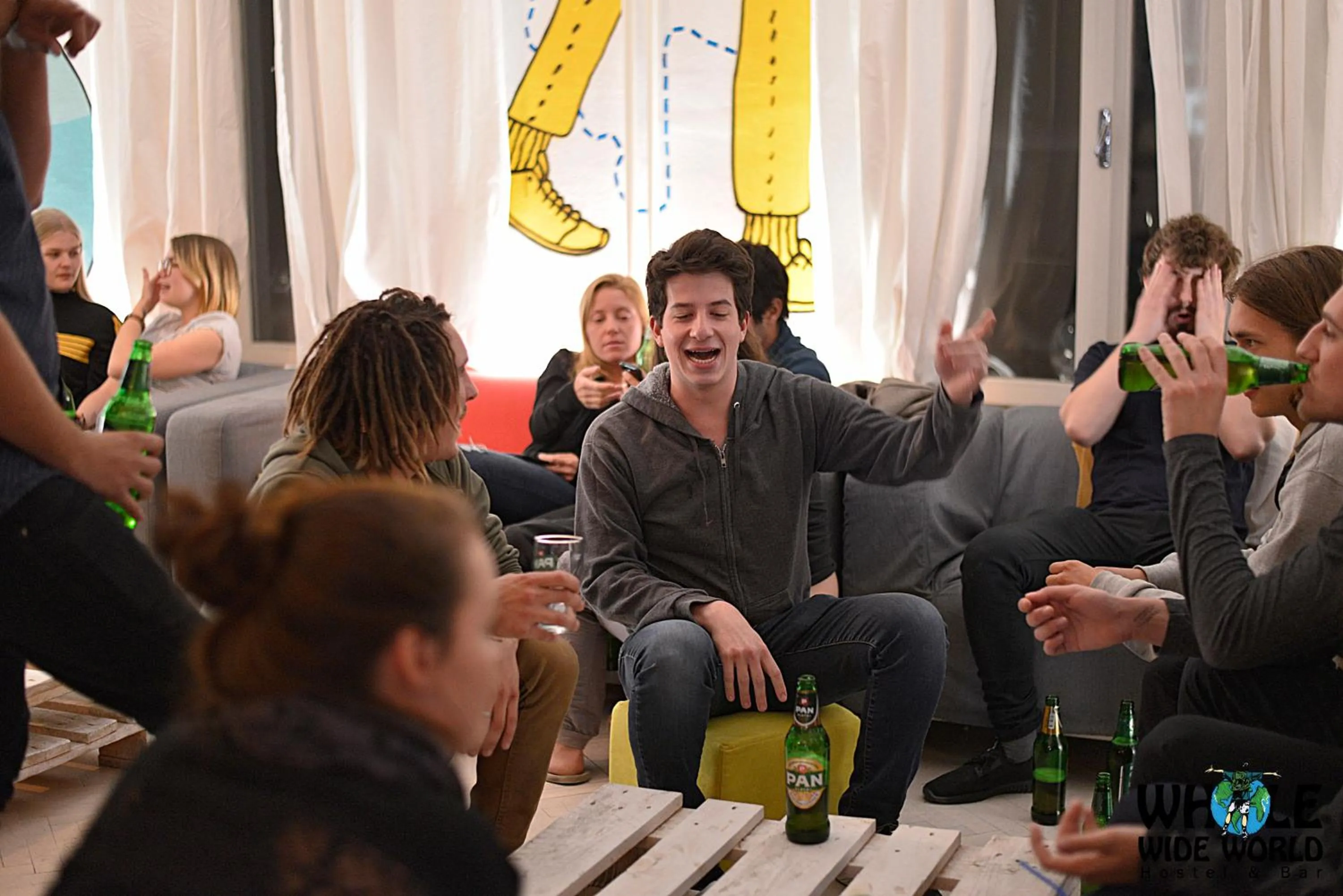 Communal lounge/ TV room in Whole Wide World Hostel