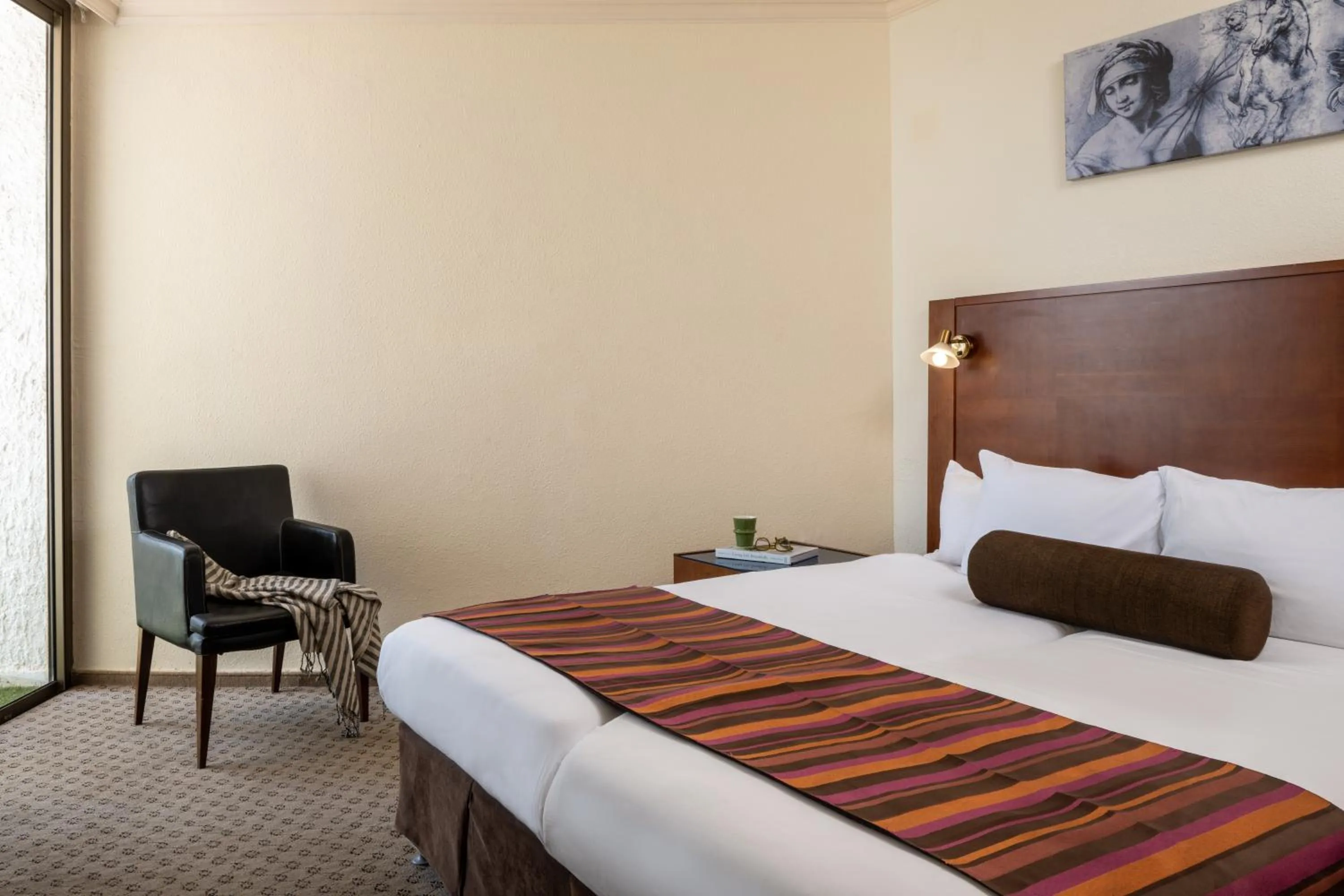 Bed in Leonardo Inn Hotel Dead Sea