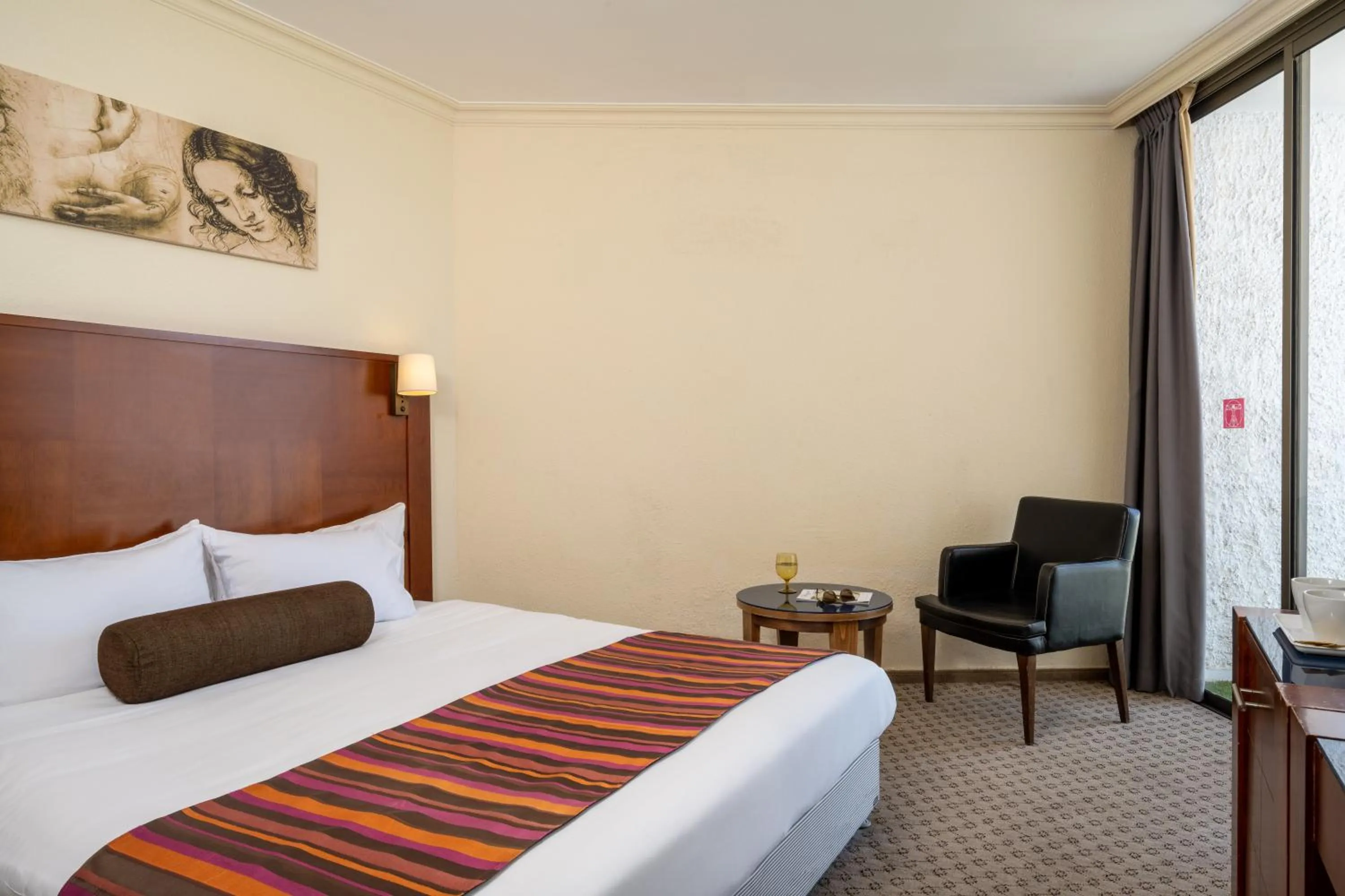 Bed in Leonardo Inn Hotel Dead Sea