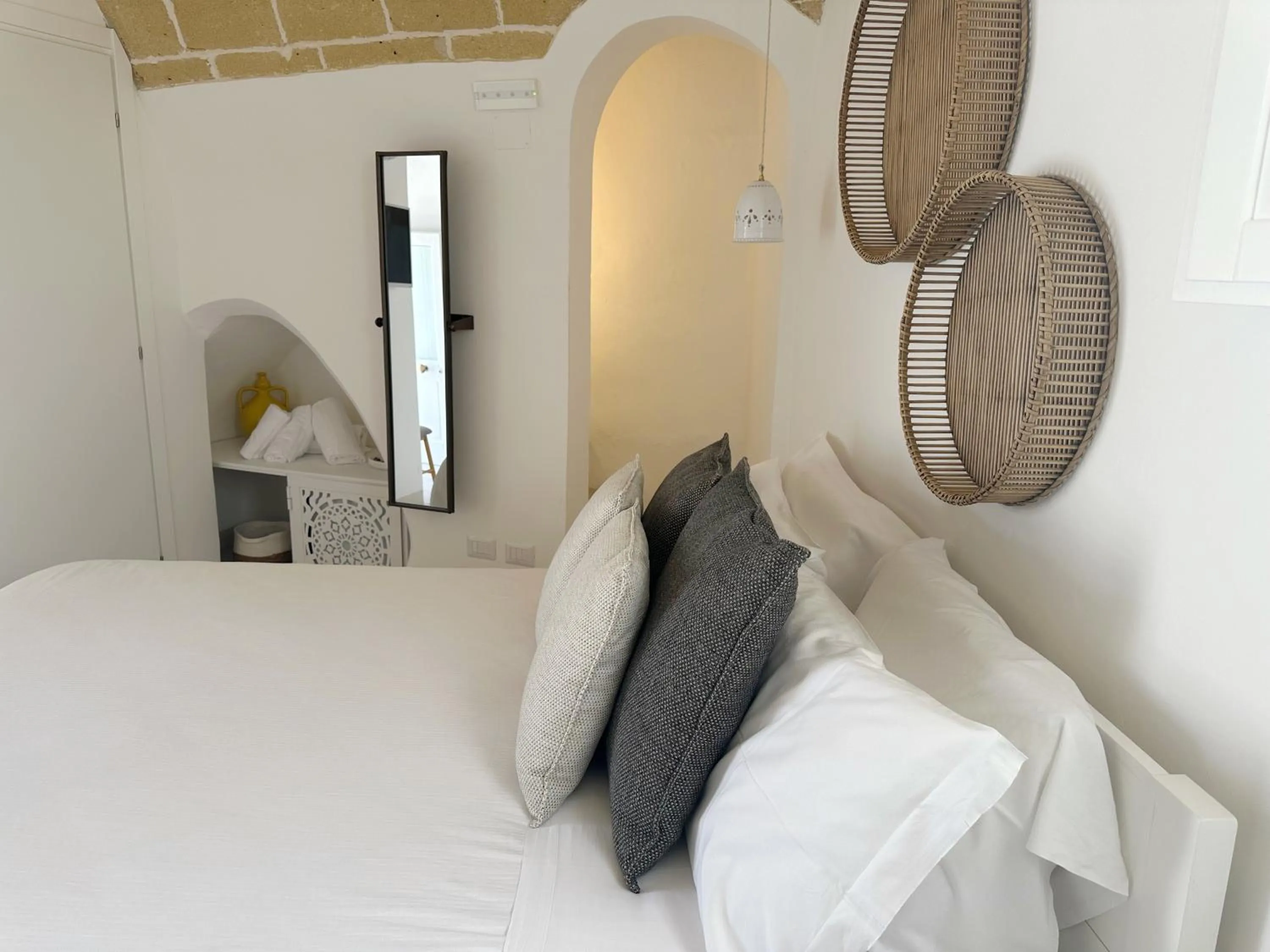 Bed in Palmieri Luxury Rooms