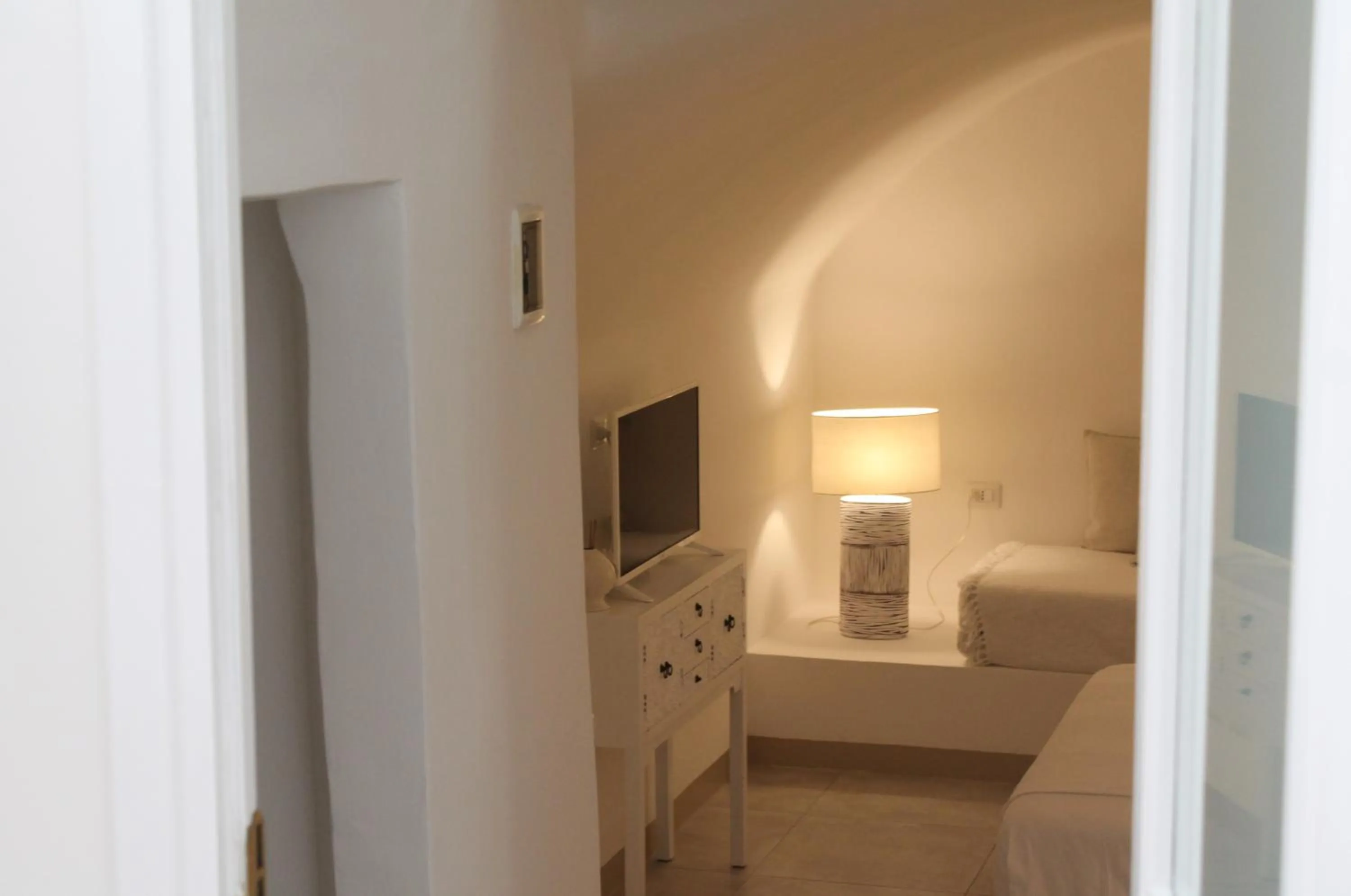 Bed in Palmieri Luxury Rooms