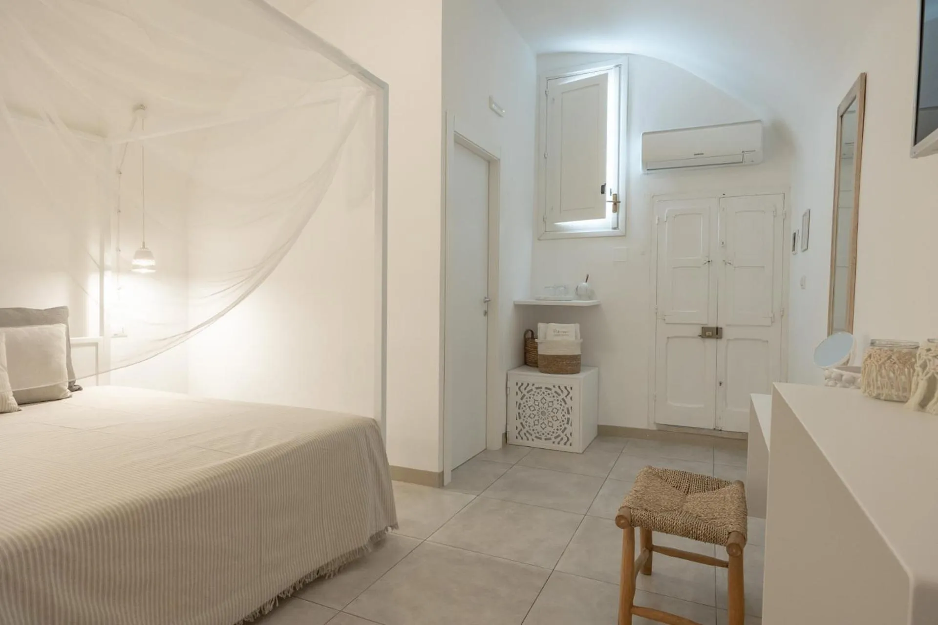 Bed in Palmieri Luxury Rooms