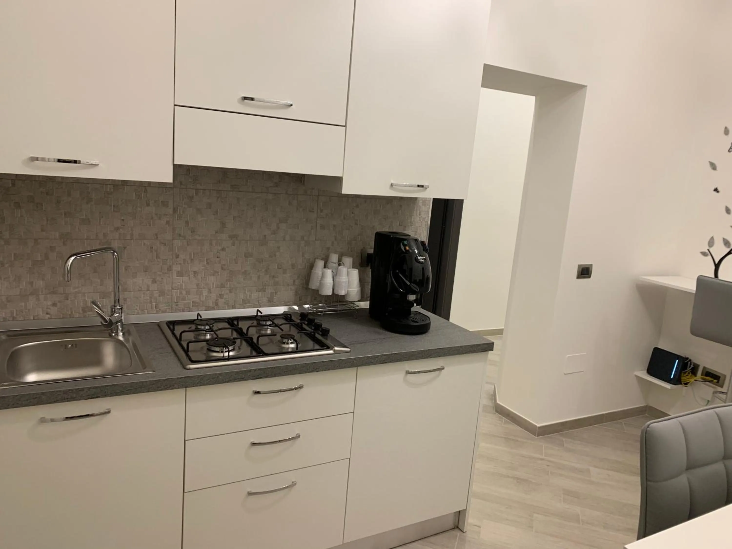 Communal kitchen in B&B Le Stanze di Santa Chiara