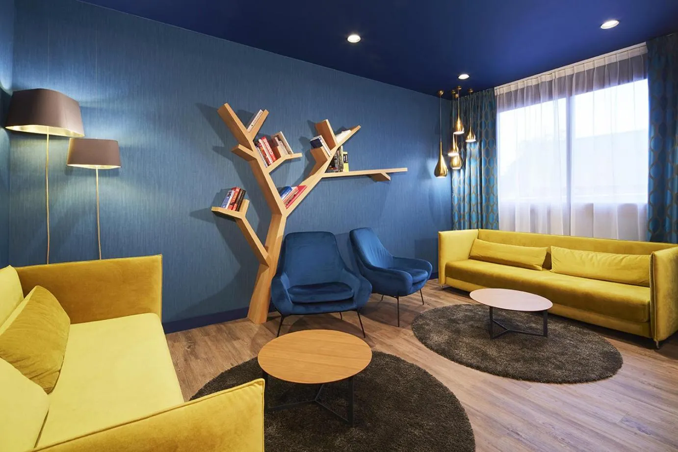 Communal lounge/ TV room in Kyriad Paris Ouest - Bezons La Défense