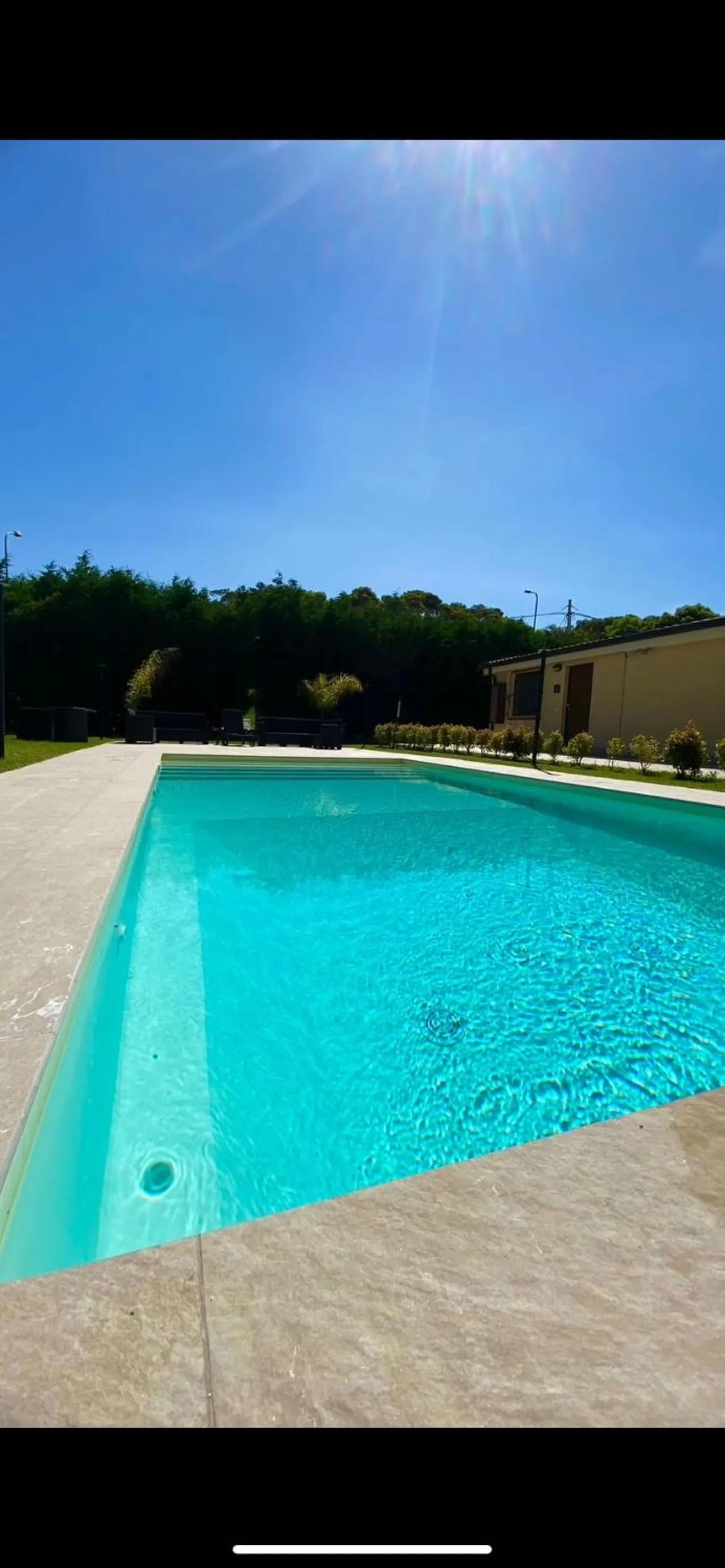 Pool view in San Michele Apartments&Rooms