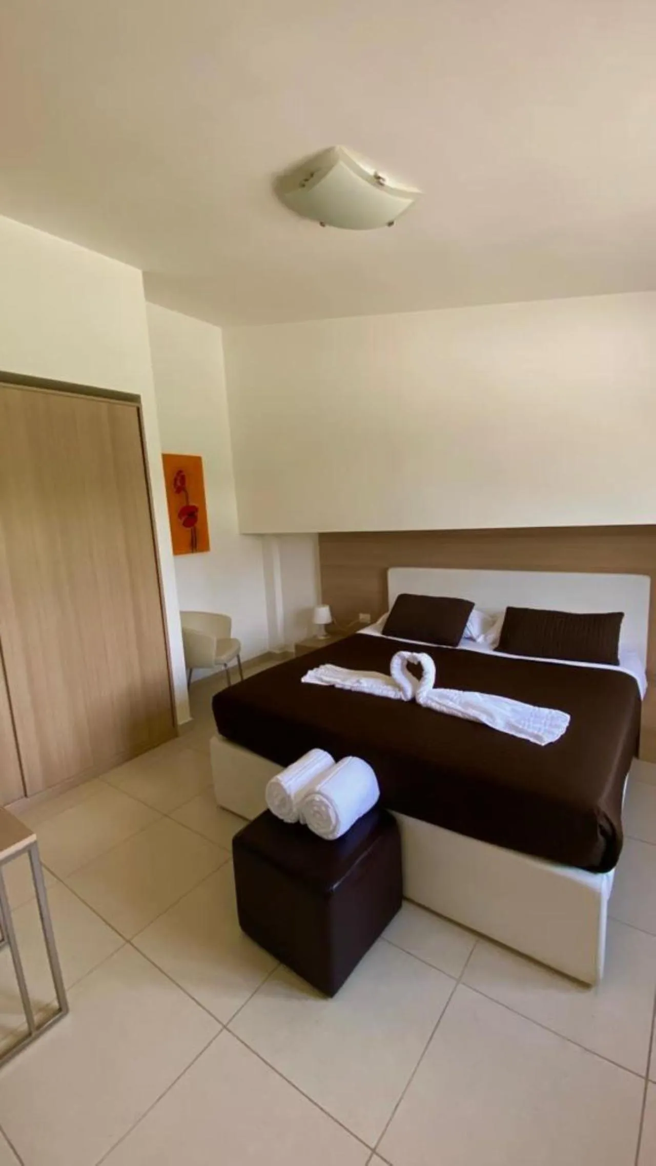 Bed in San Michele Apartments&Rooms