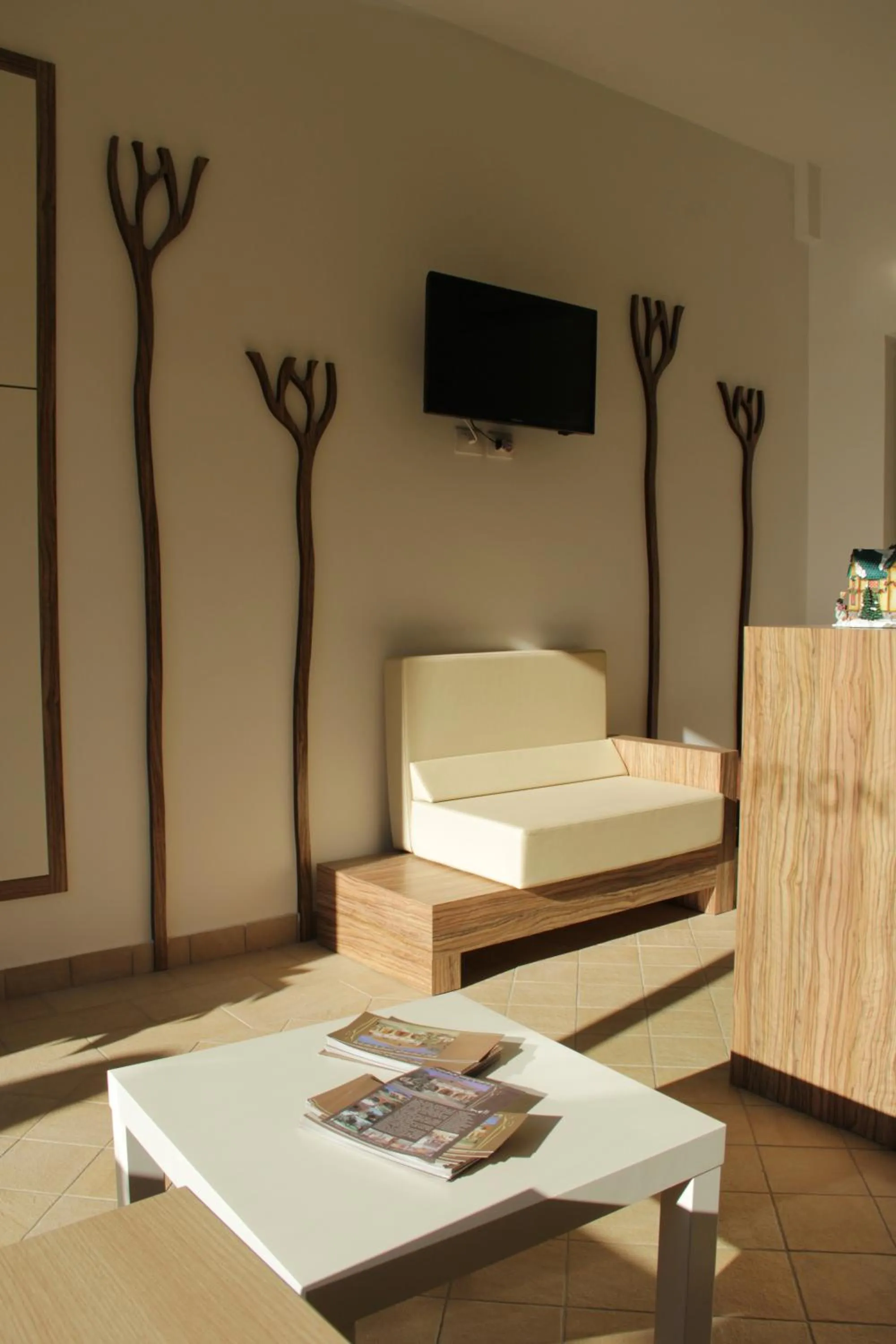 Lobby or reception in San Michele Apartments&Rooms