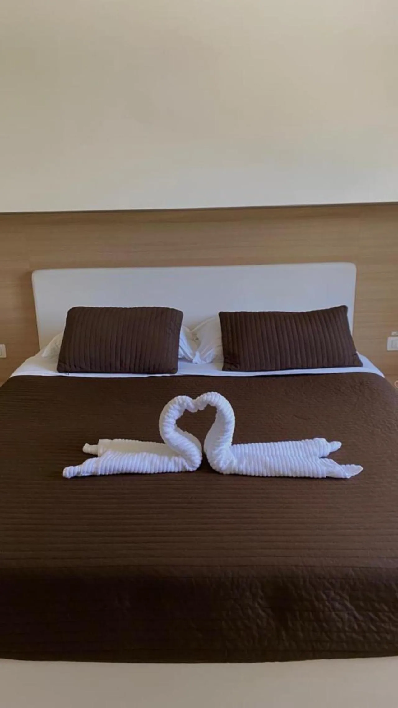 Bed in San Michele Apartments&Rooms