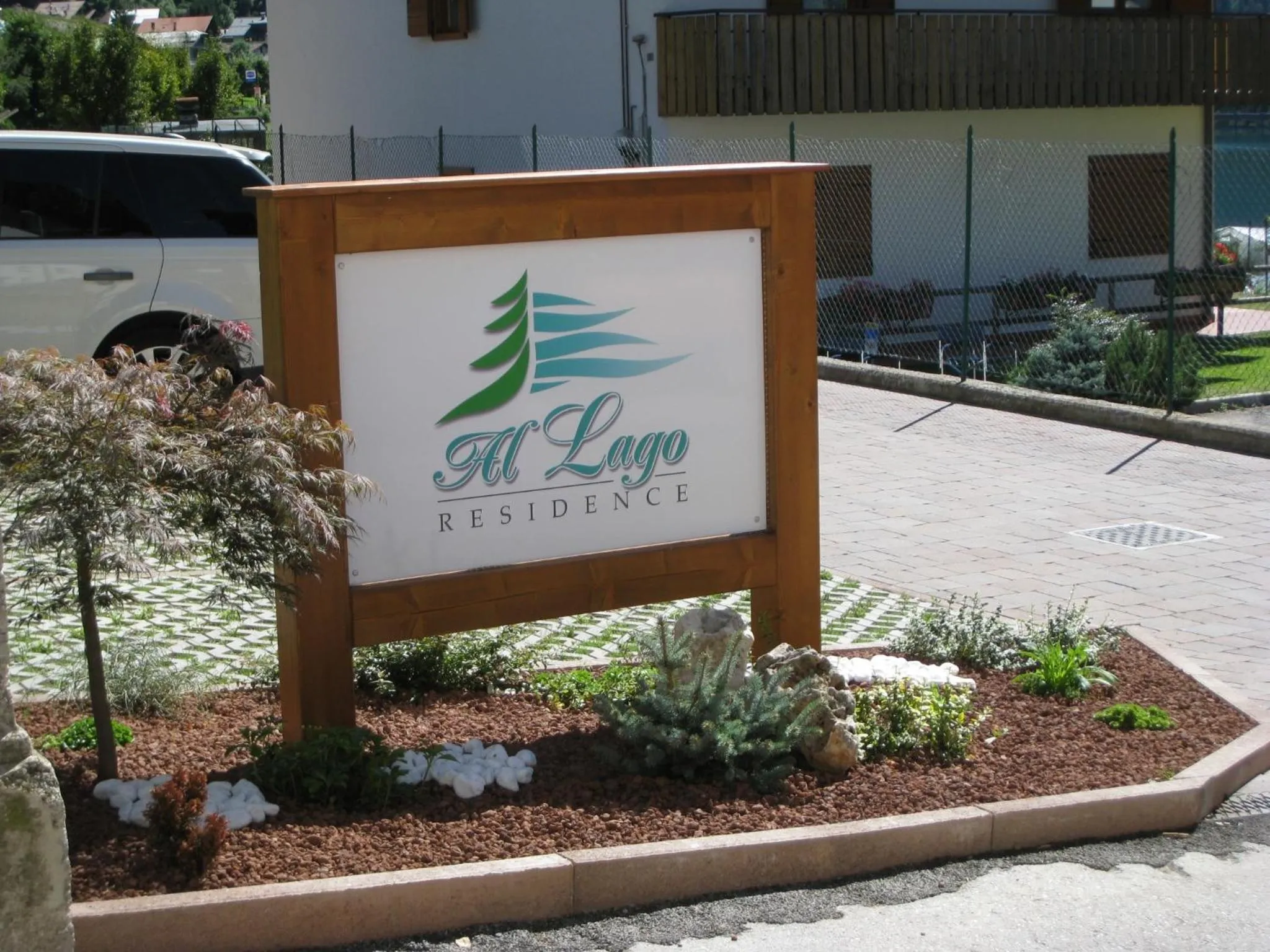 Property logo or sign in Residence Al Lago