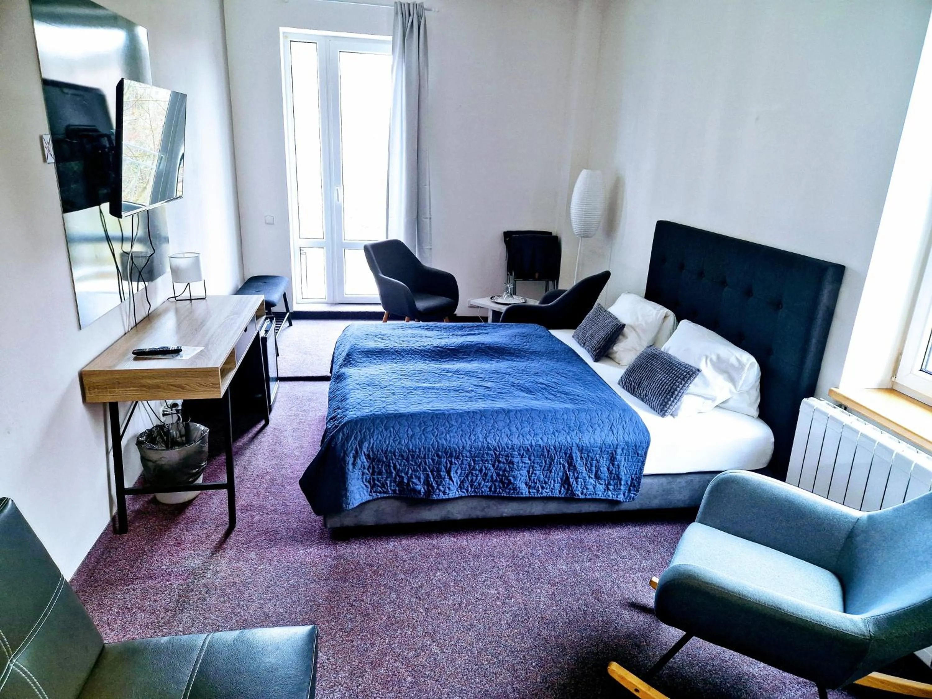 Bed in Family hotel Maxim