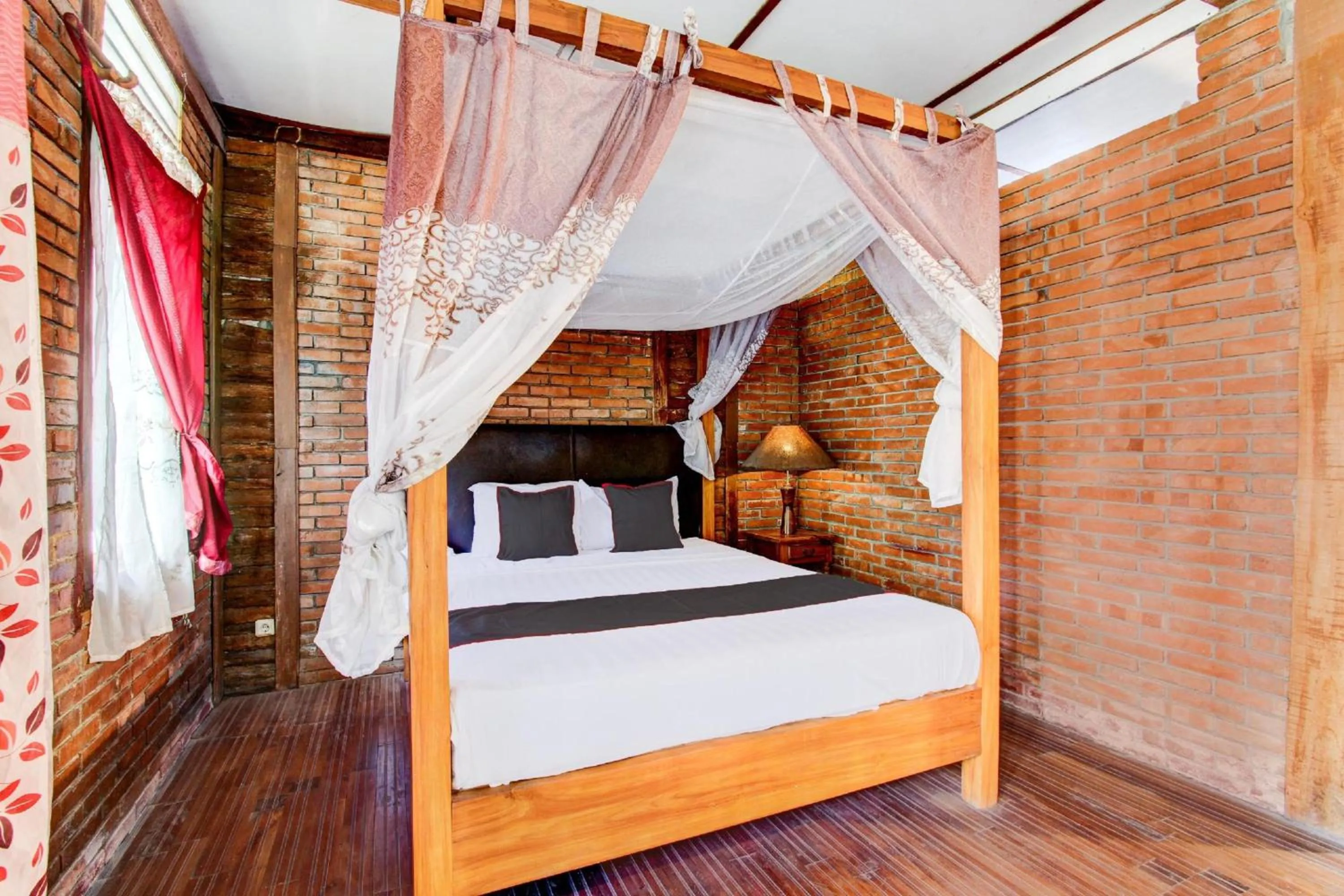 Photo of the whole room, Bed in Hotel O Prawirotaman Near Keraton Yogyakarta Formerly Chez Laelik Guesthouse