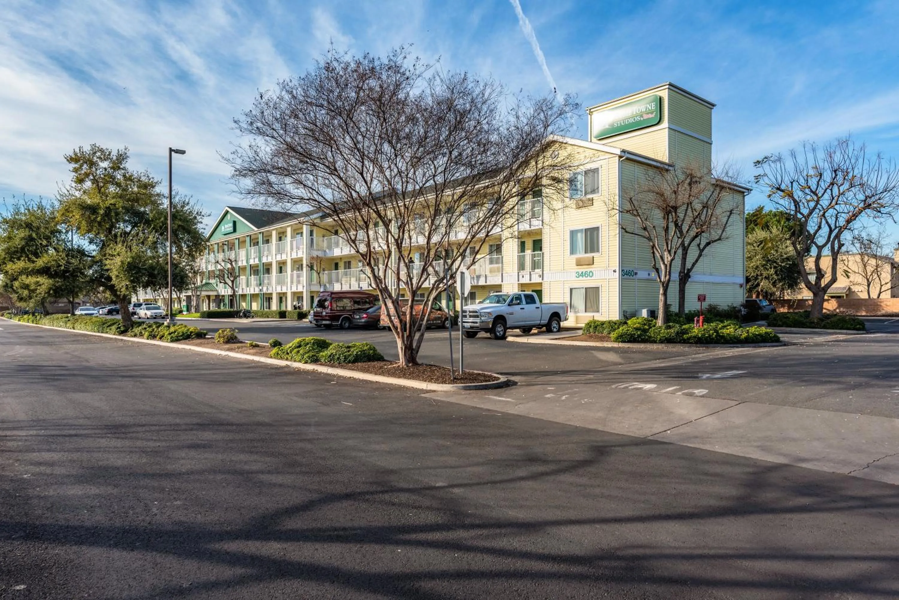 Property building in HomeTowne Studios by Red Roof Fresno - West