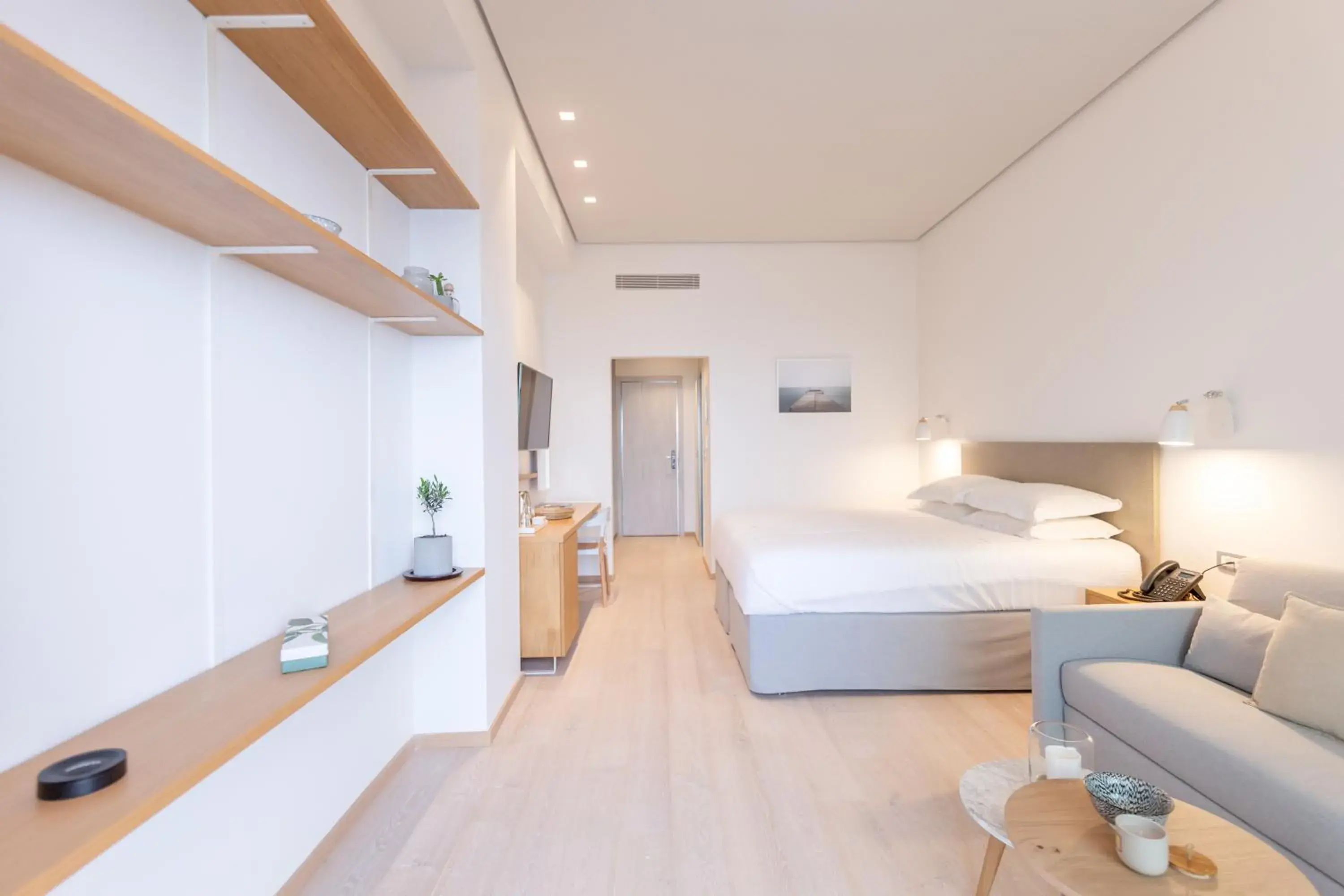 Superior Quadruple Room in Messinian Icon Hotel & Suites Superior Quadruple Room in Messinian Icon Hotel & Suites