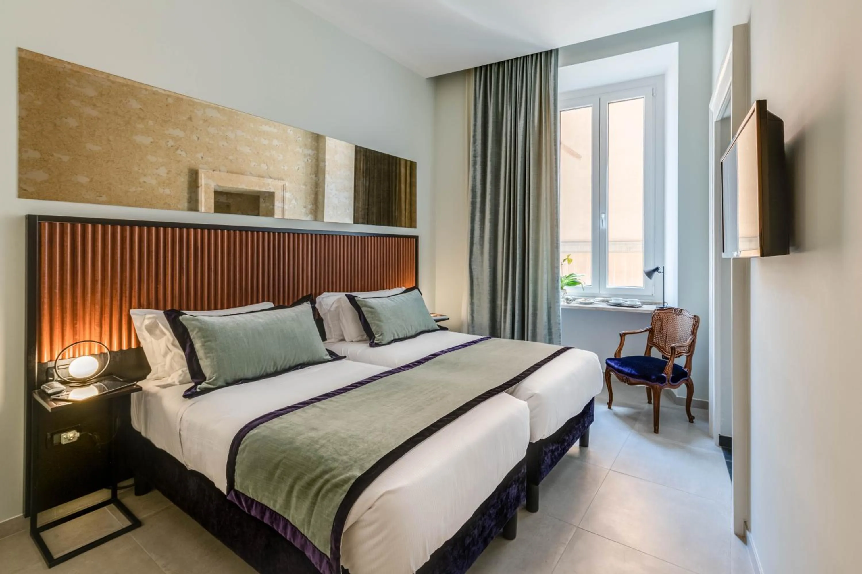 Bed in Adrianus Hotel