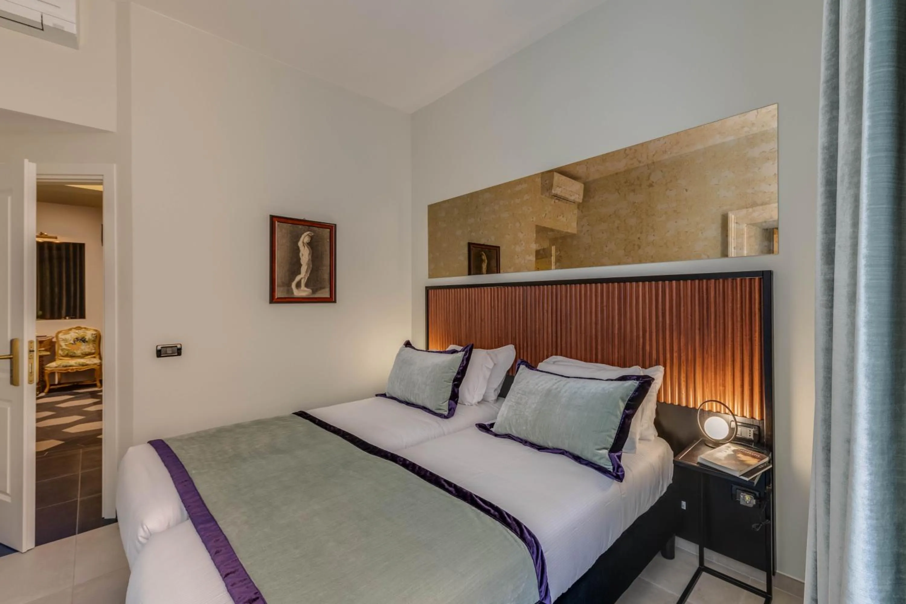 Bed in Adrianus Hotel