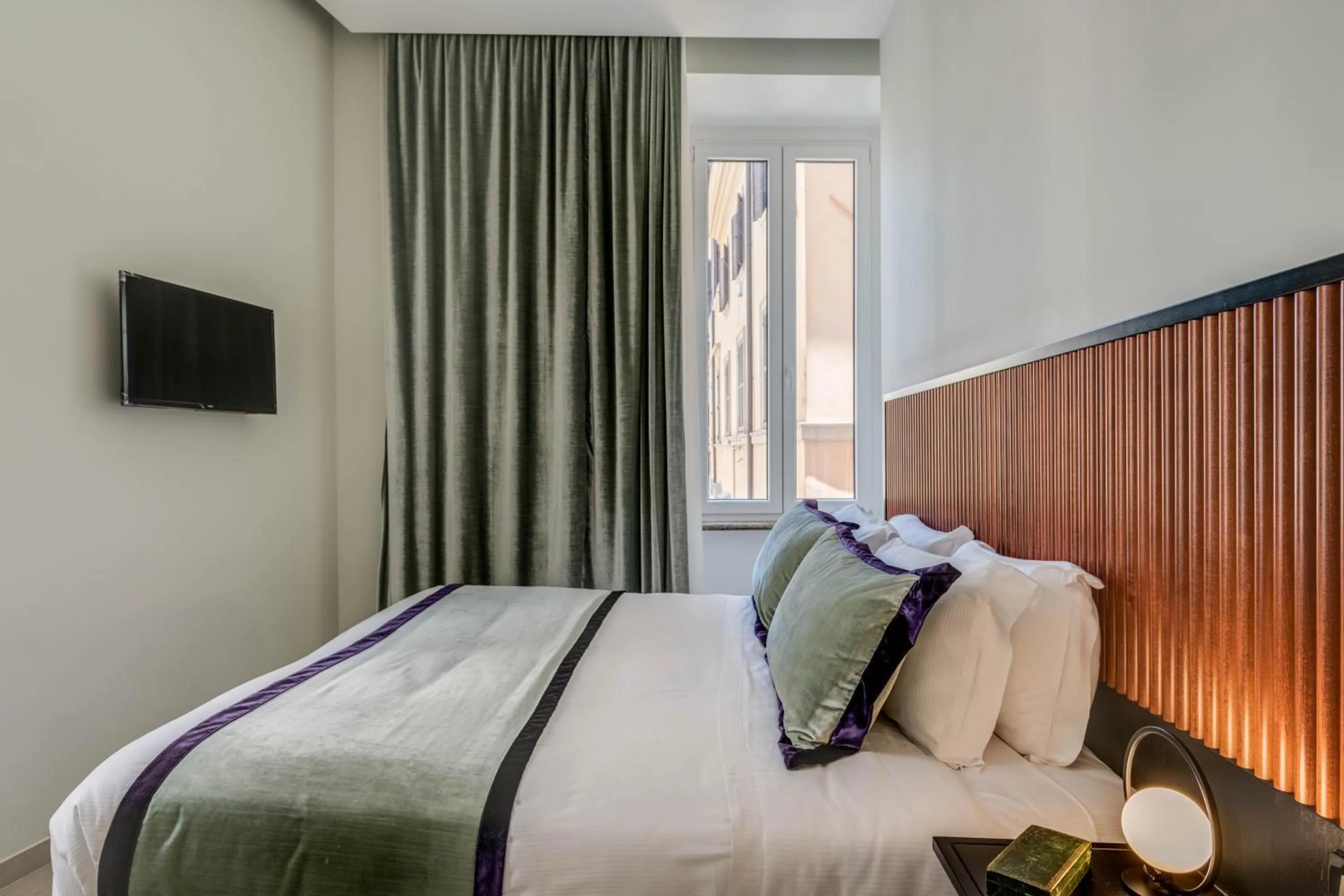 Bed in Adrianus Hotel