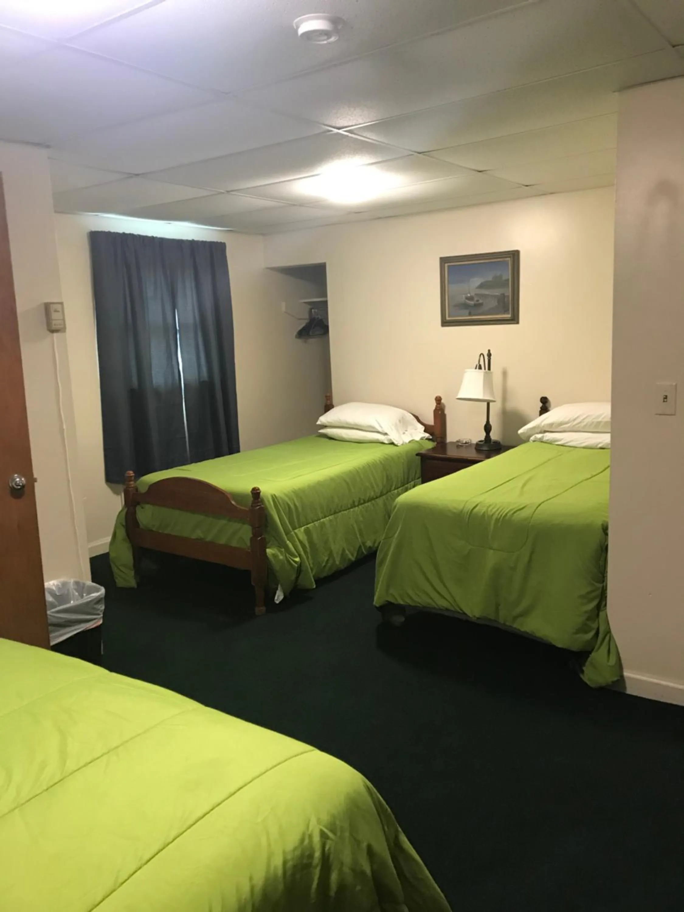 Bed in Evergreen Motel