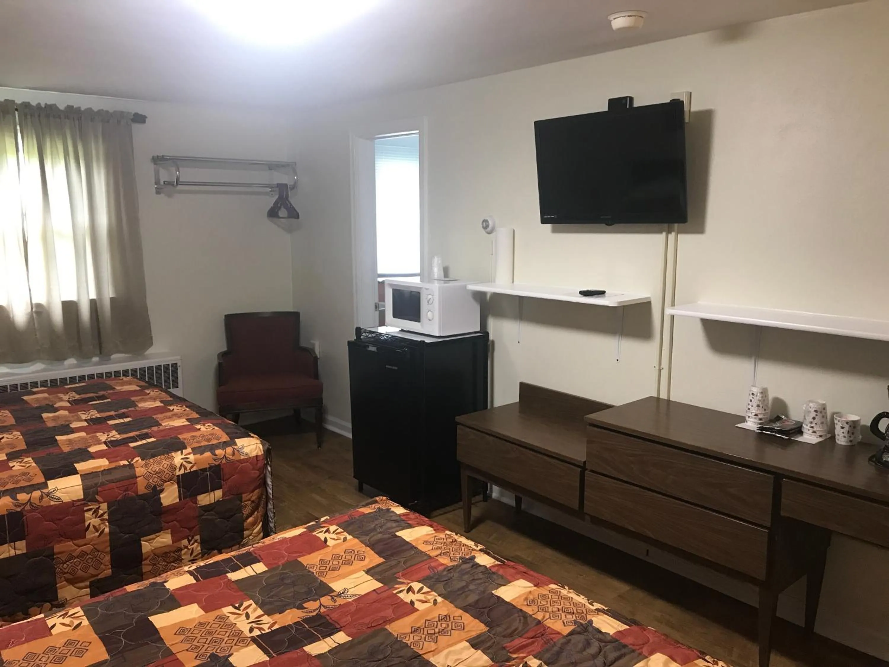 Bed in Evergreen Motel