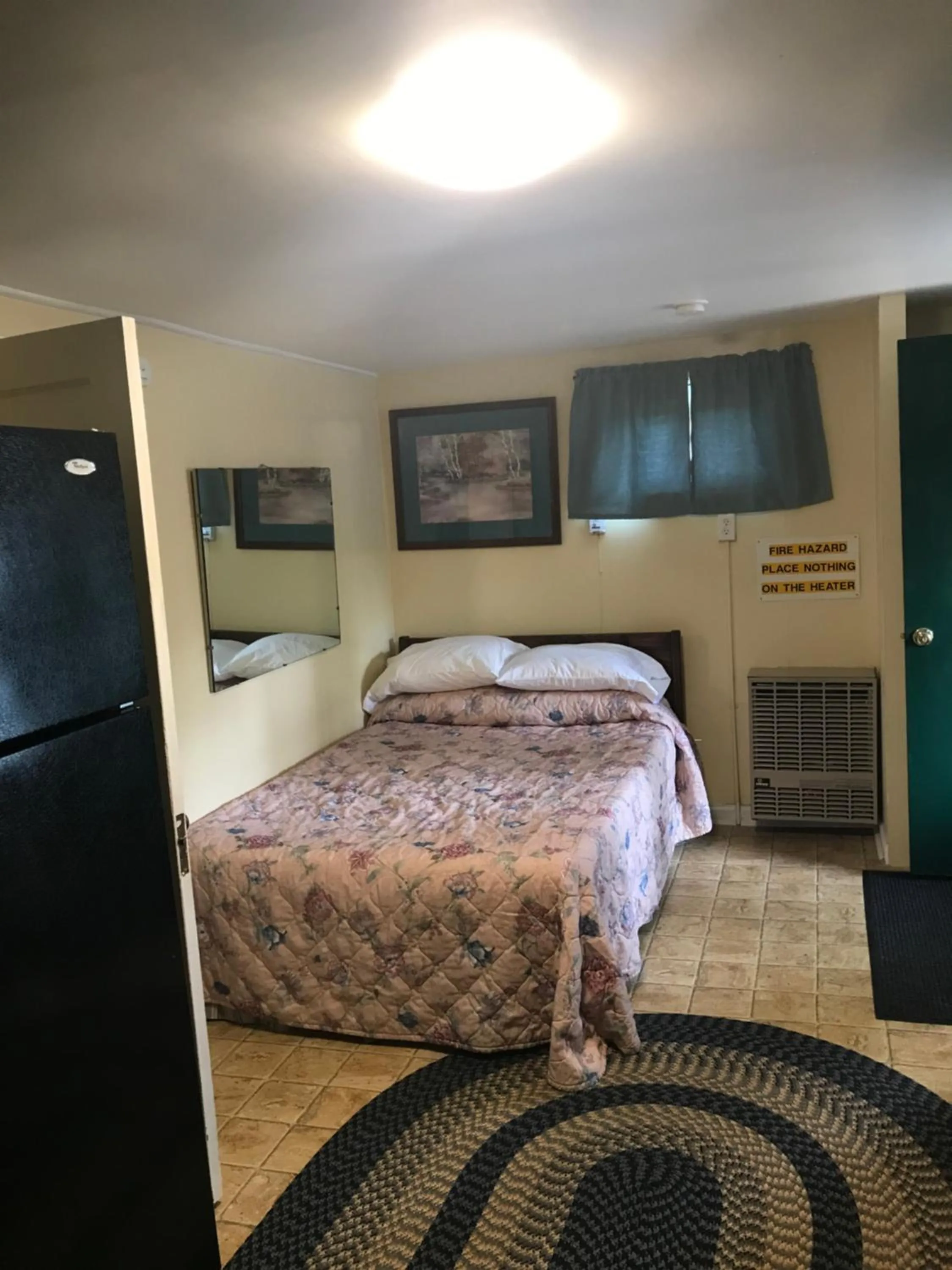 Bed in Evergreen Motel