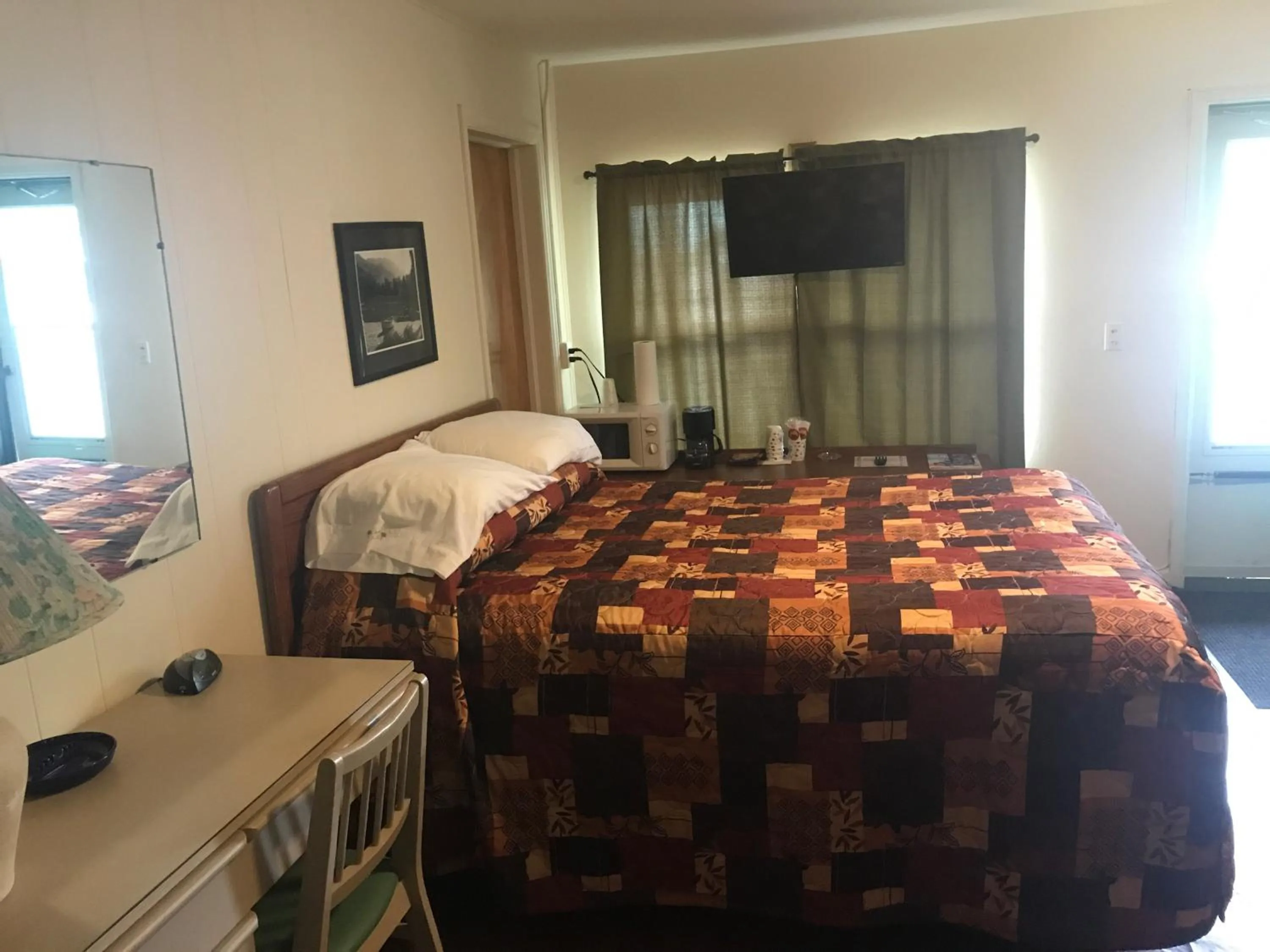 Bed in Evergreen Motel