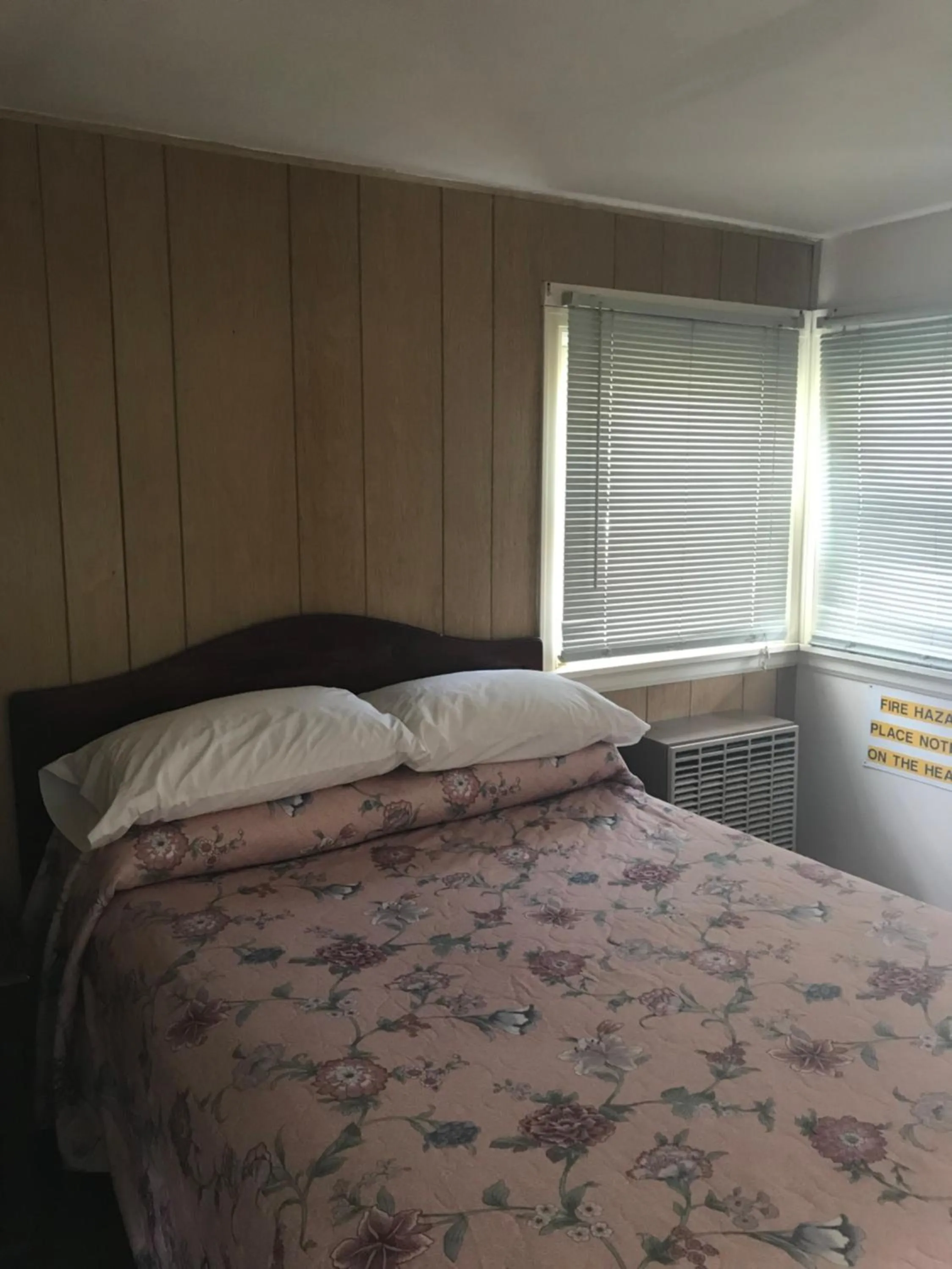 Bed in Evergreen Motel