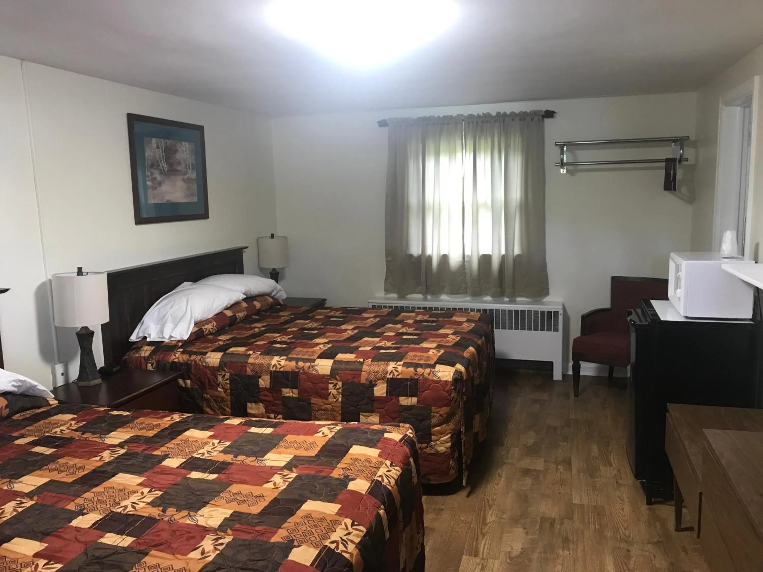 Bed in Evergreen Motel