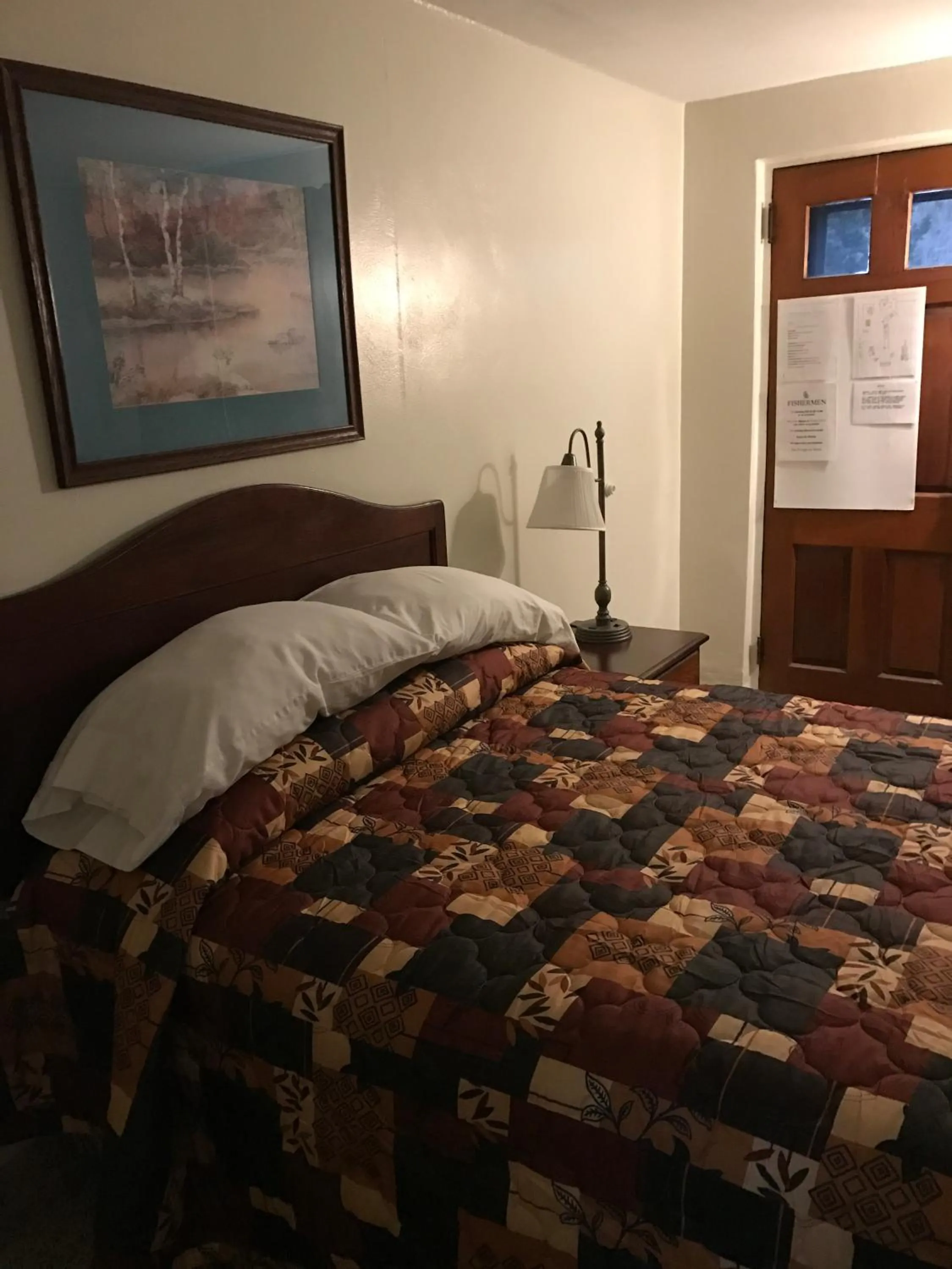 Bed in Evergreen Motel