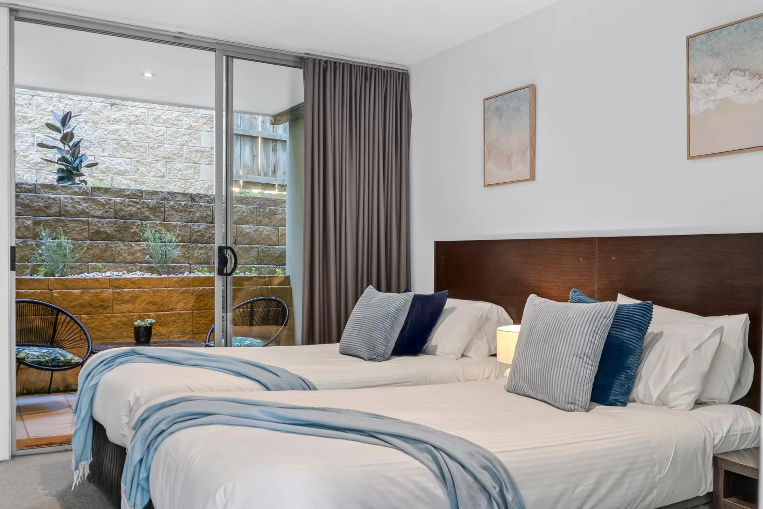 Patio, Bed in The Dolphin Apartments