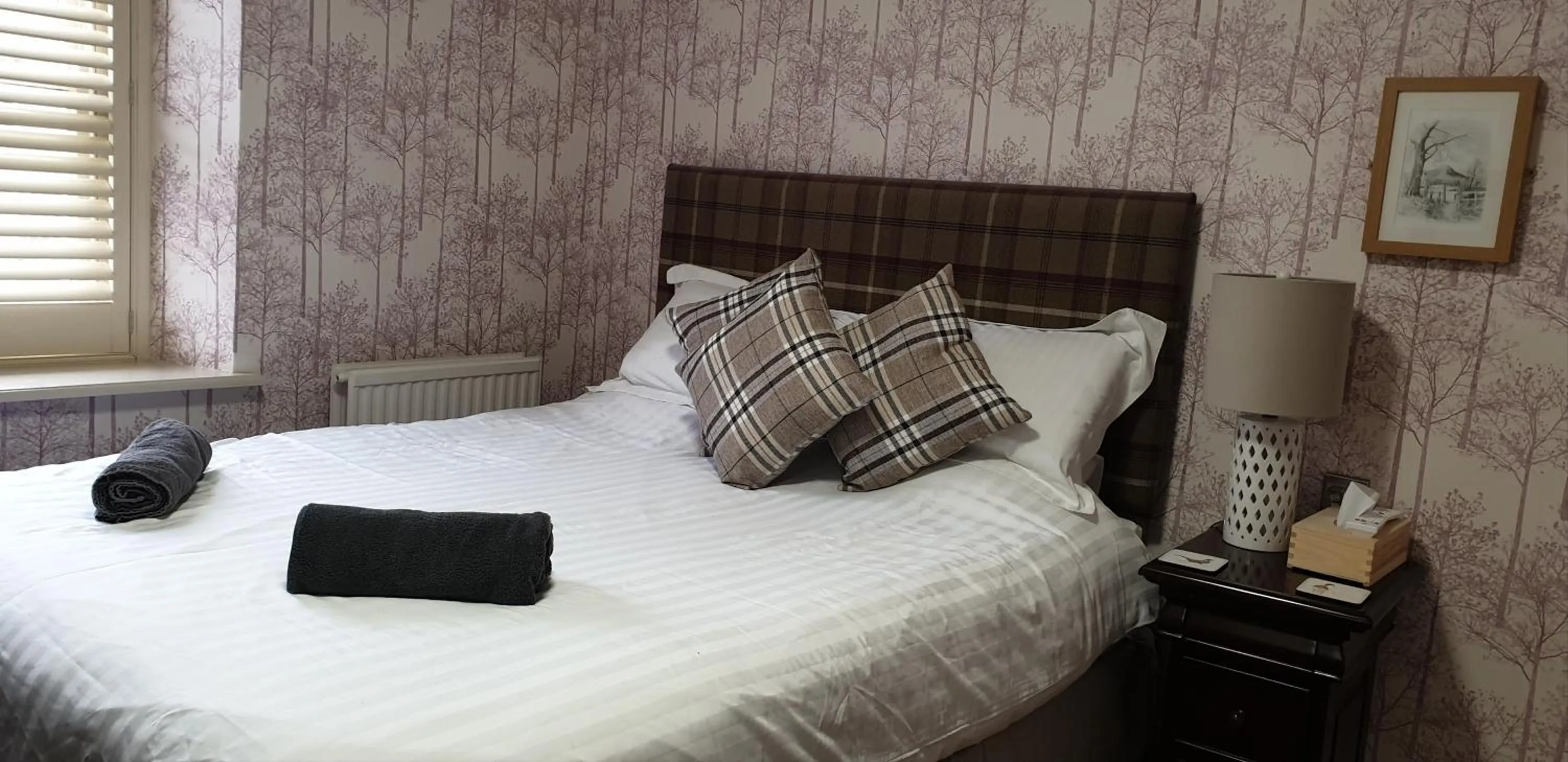 Bed in The Queen Catherine Hotel