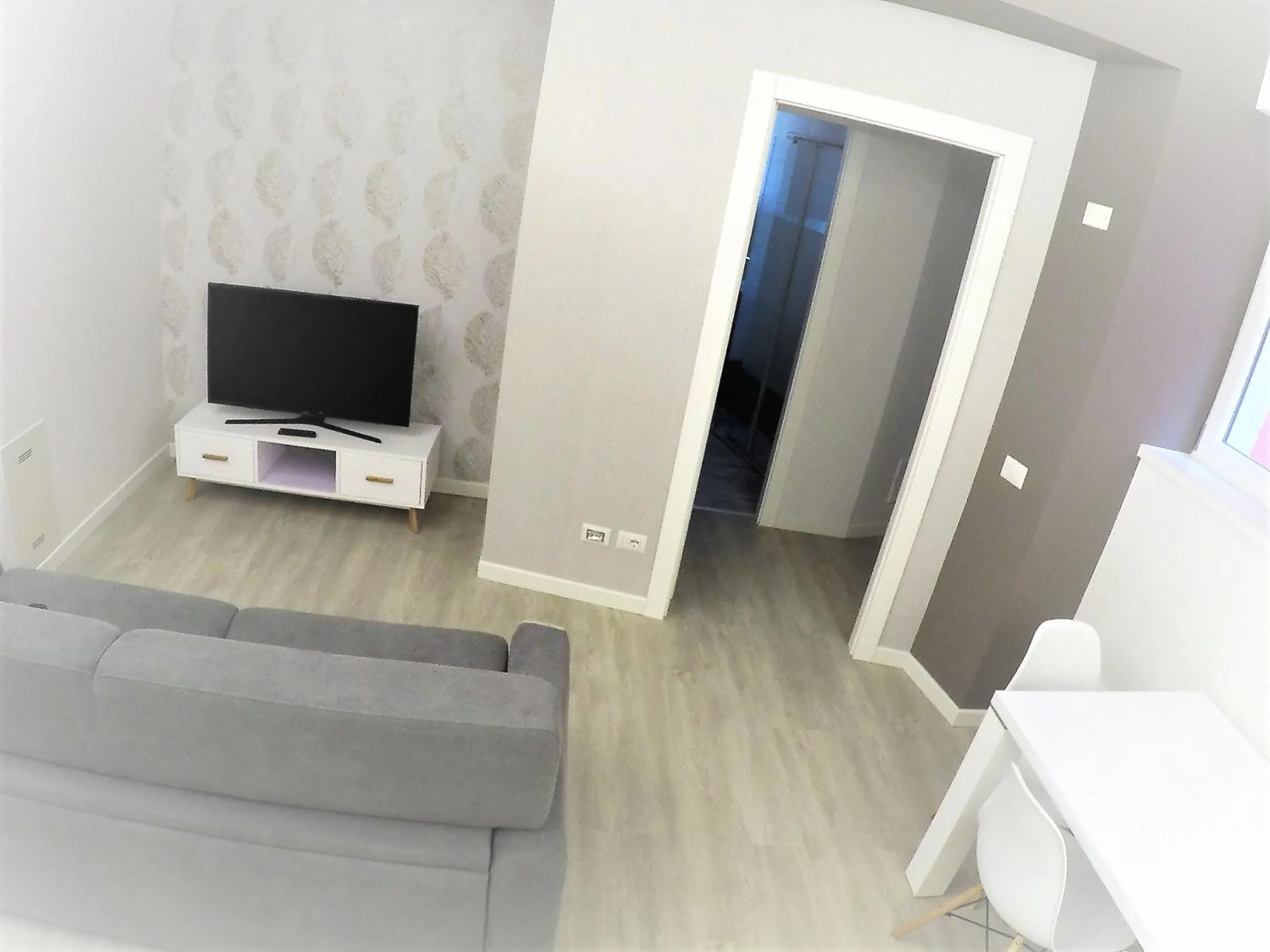 Communal lounge/ TV room in Dolce Notte Apartments