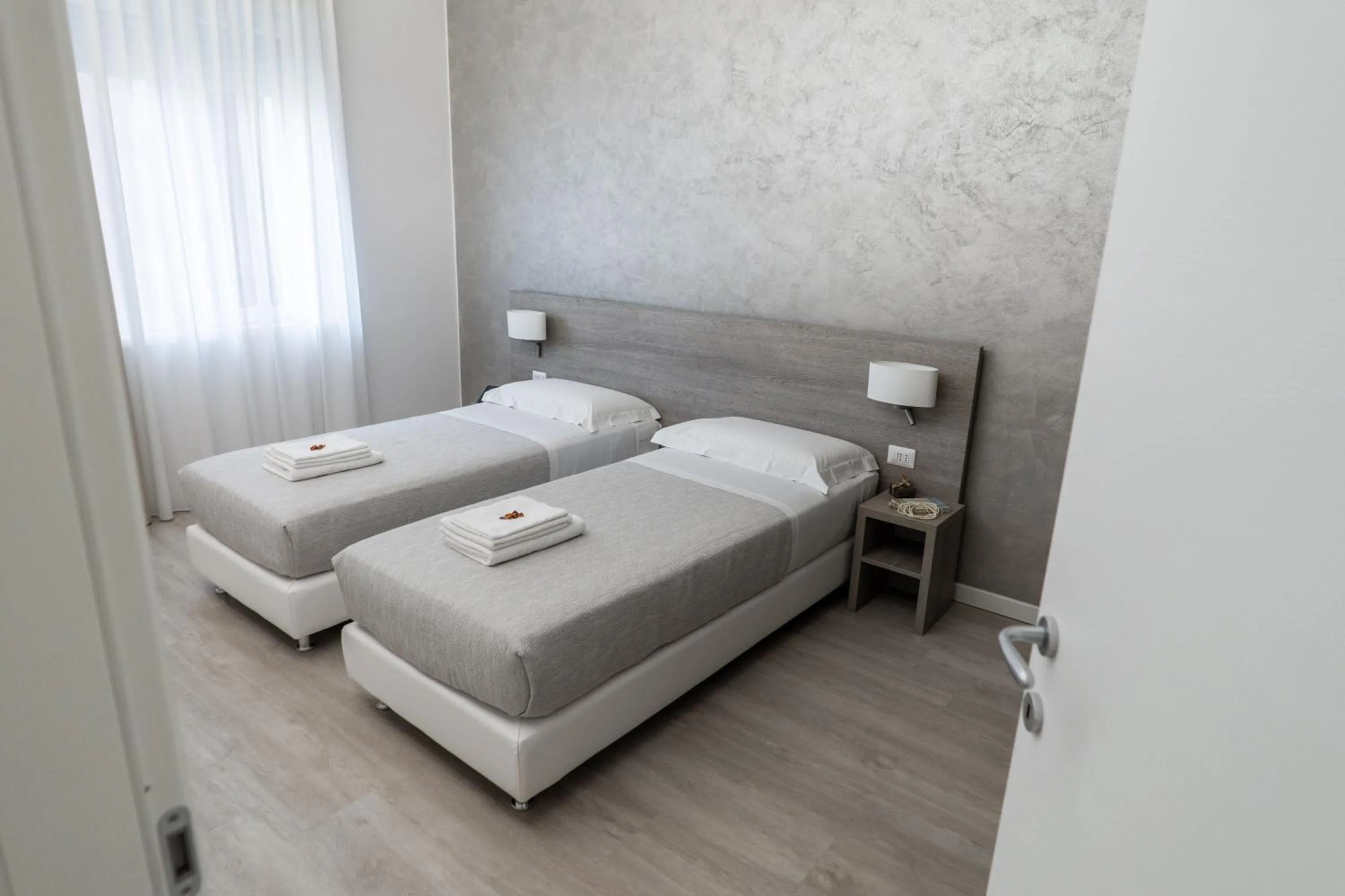 Bed in Dolce Notte Apartments