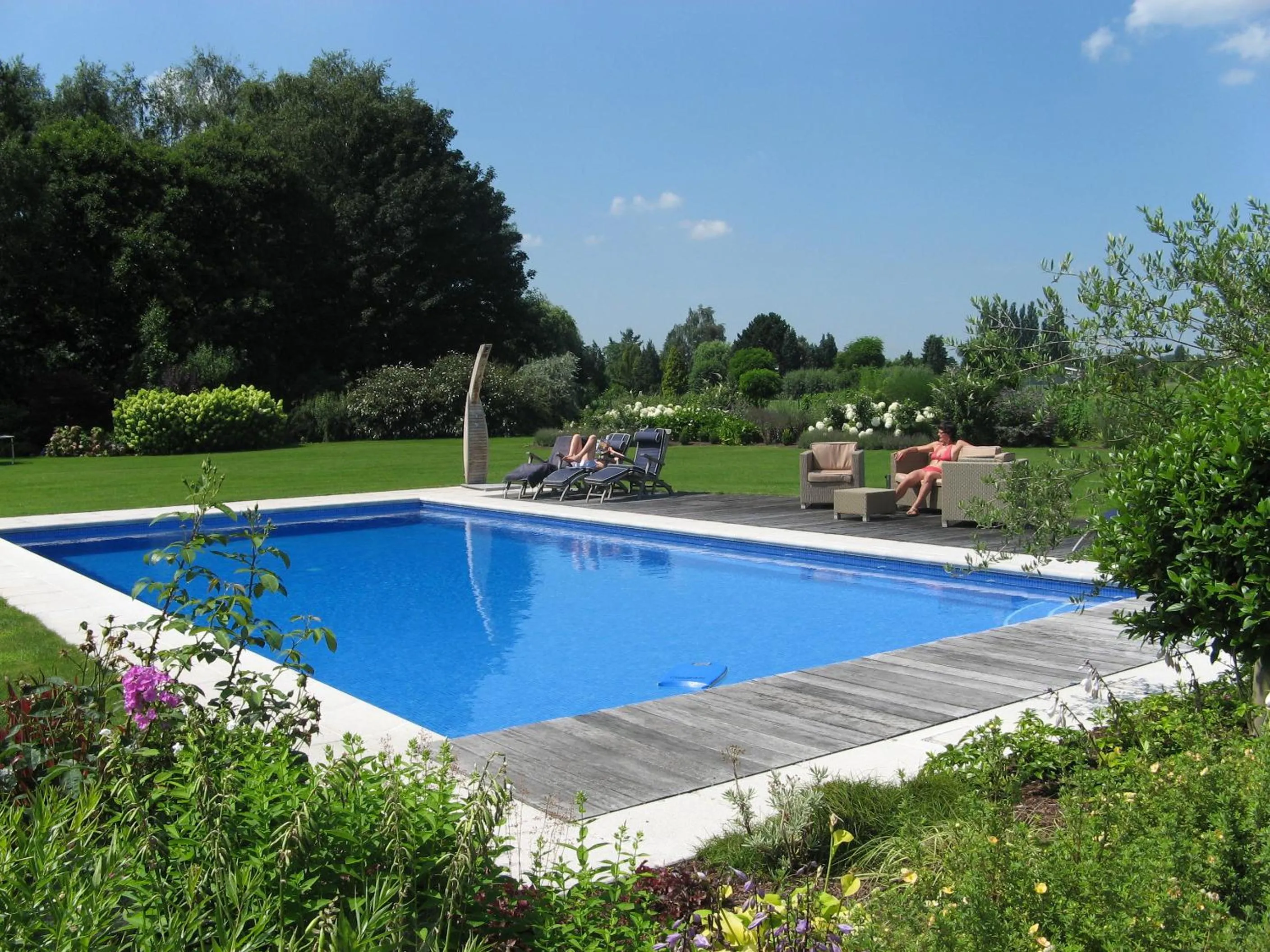 Swimming pool in B&B Au Grenier
