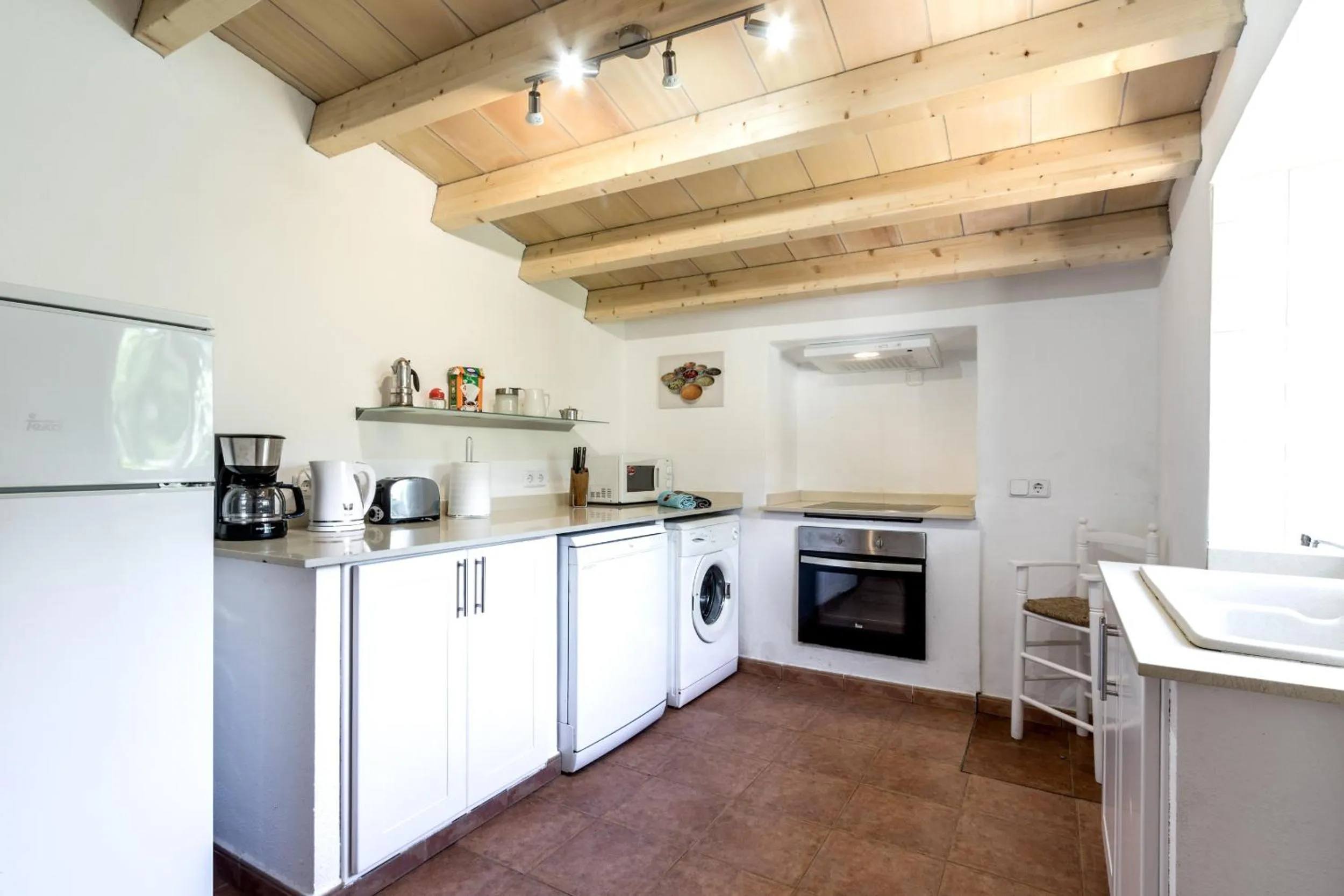 Kitchen or kitchenette in Villa La Palmera By homevillas360