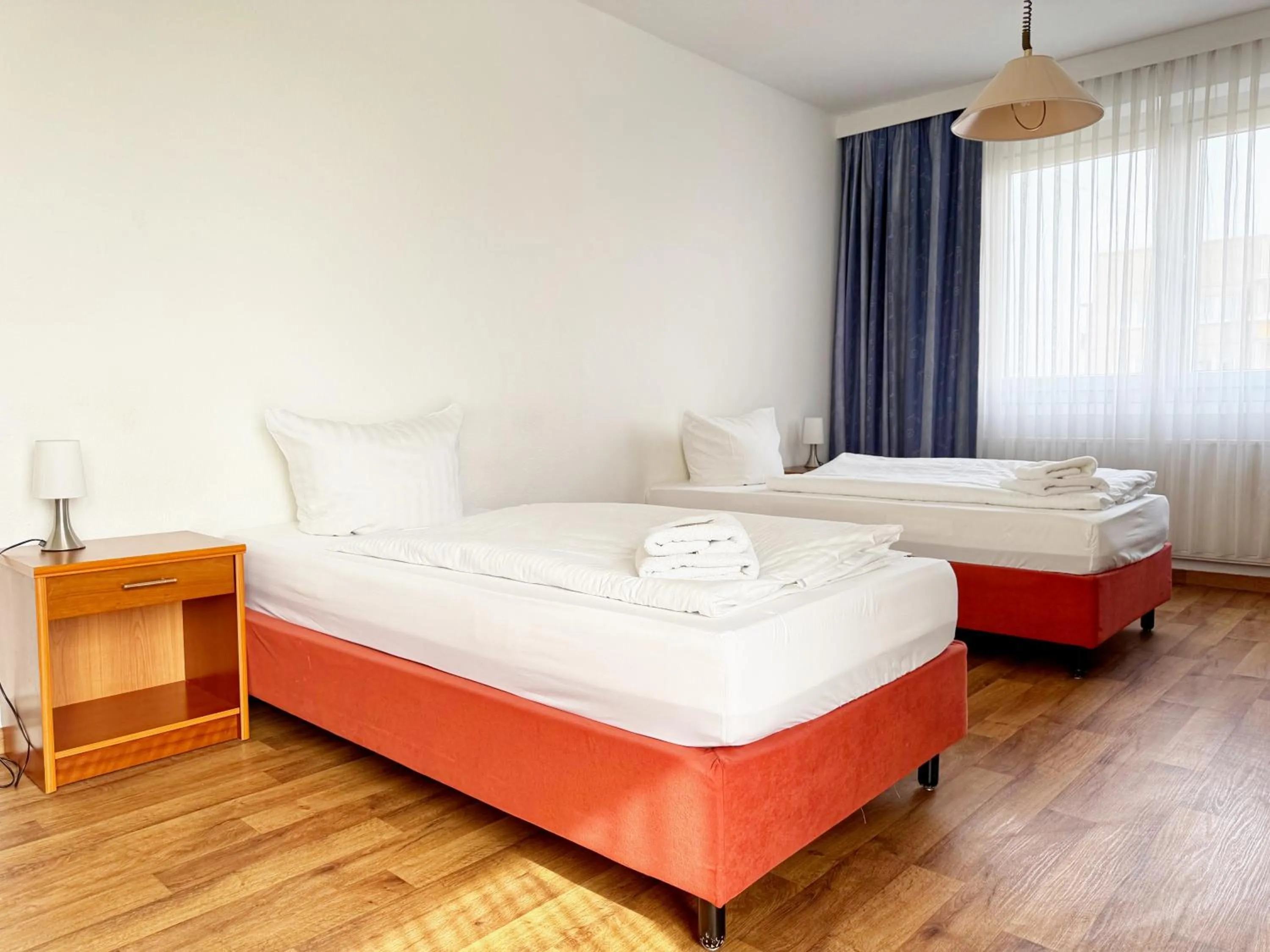 Bed in Alpha Apparthotel leipzig-Rötha