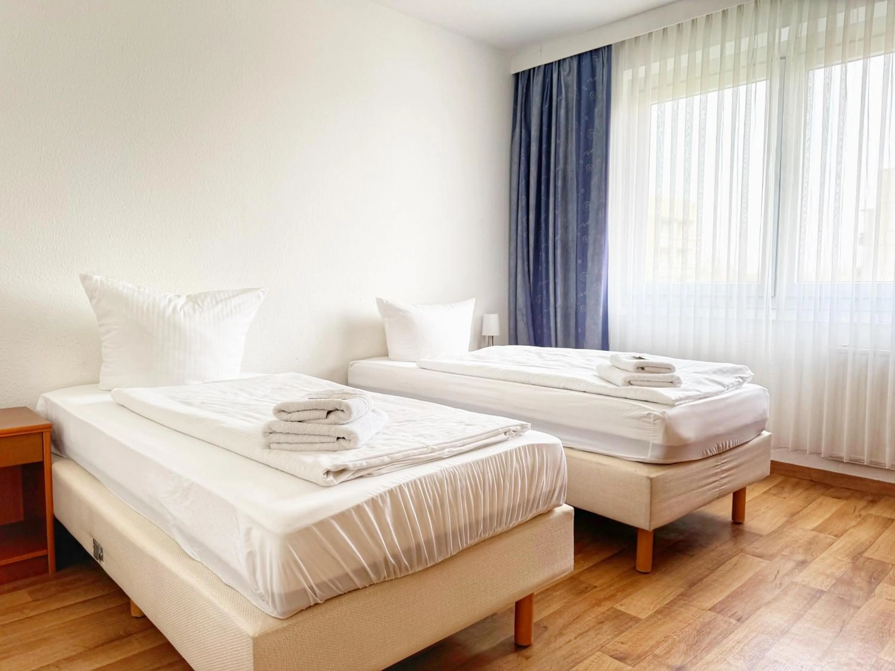 Bed in Alpha Apparthotel leipzig-Rötha