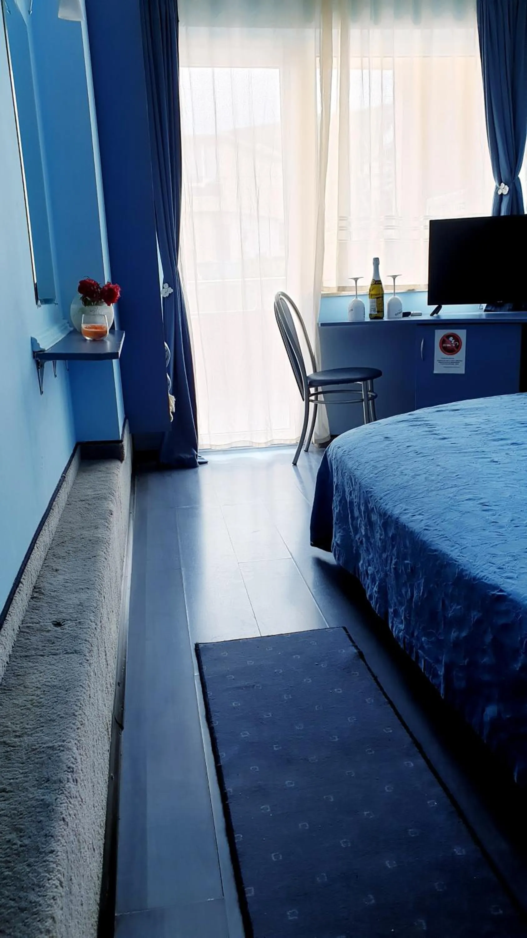 Bed in Paralax Hotel