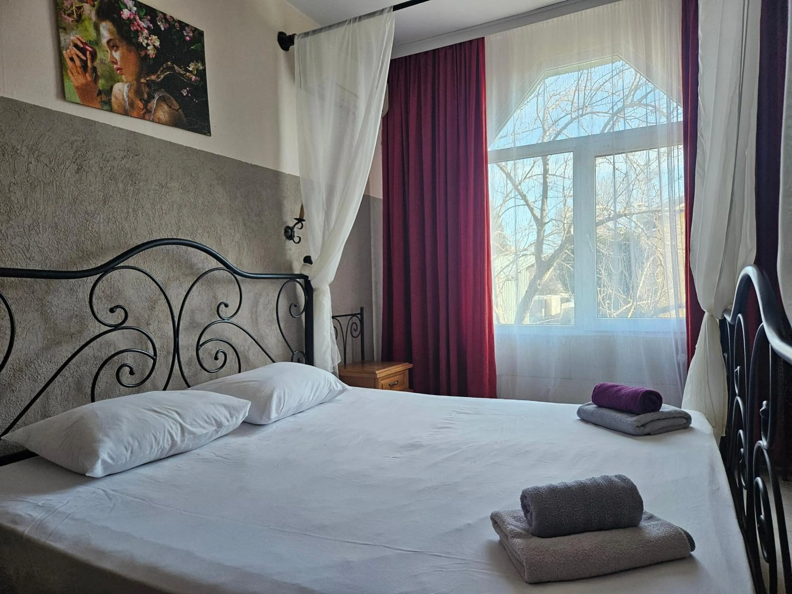 Bed in Paralax Hotel