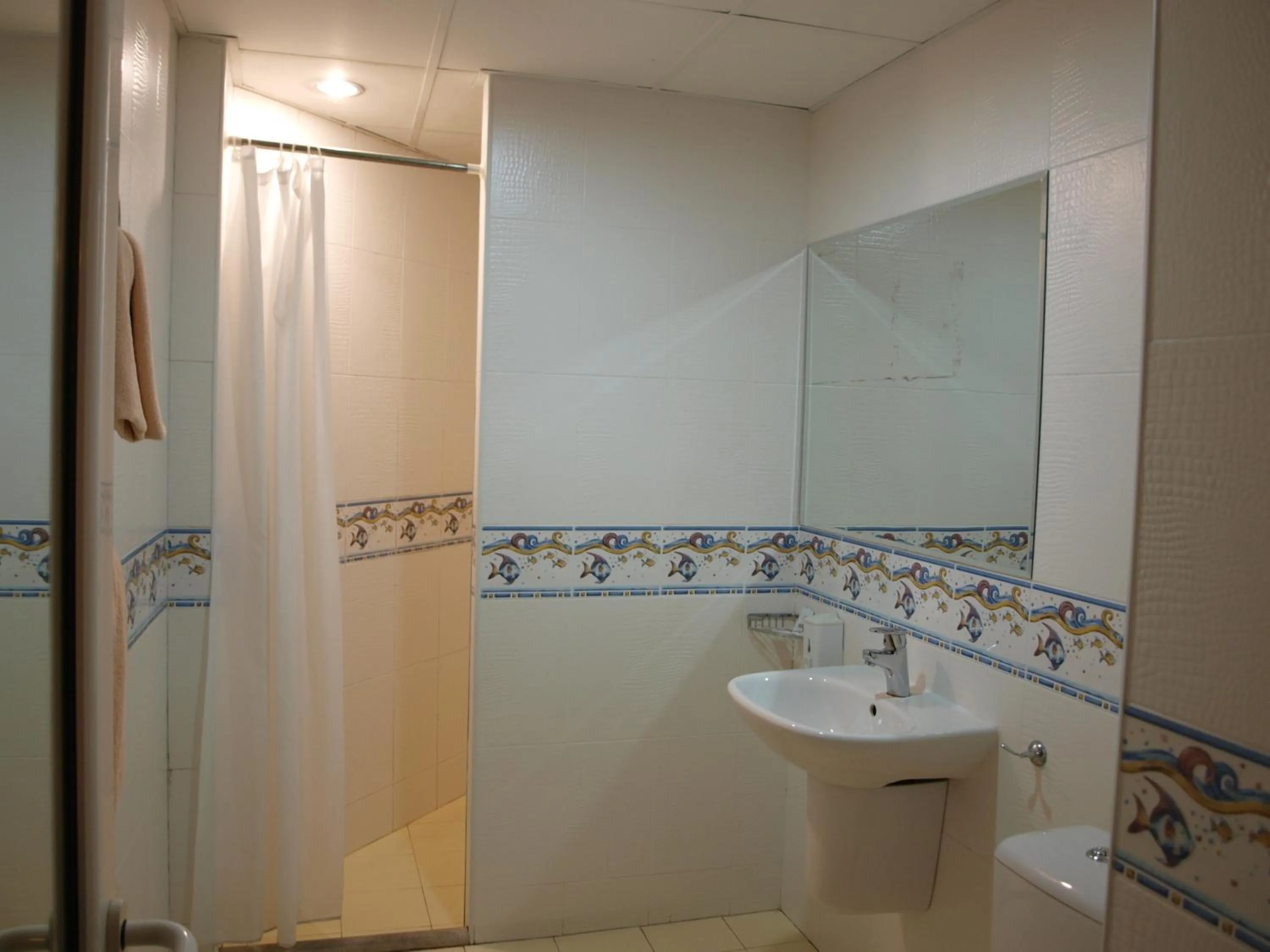 Bathroom in Paralax Hotel