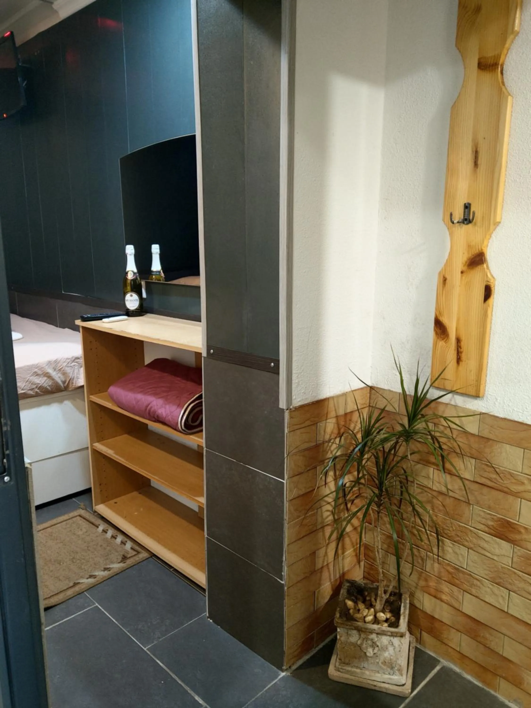 wardrobe, Bed in Paralax Hotel