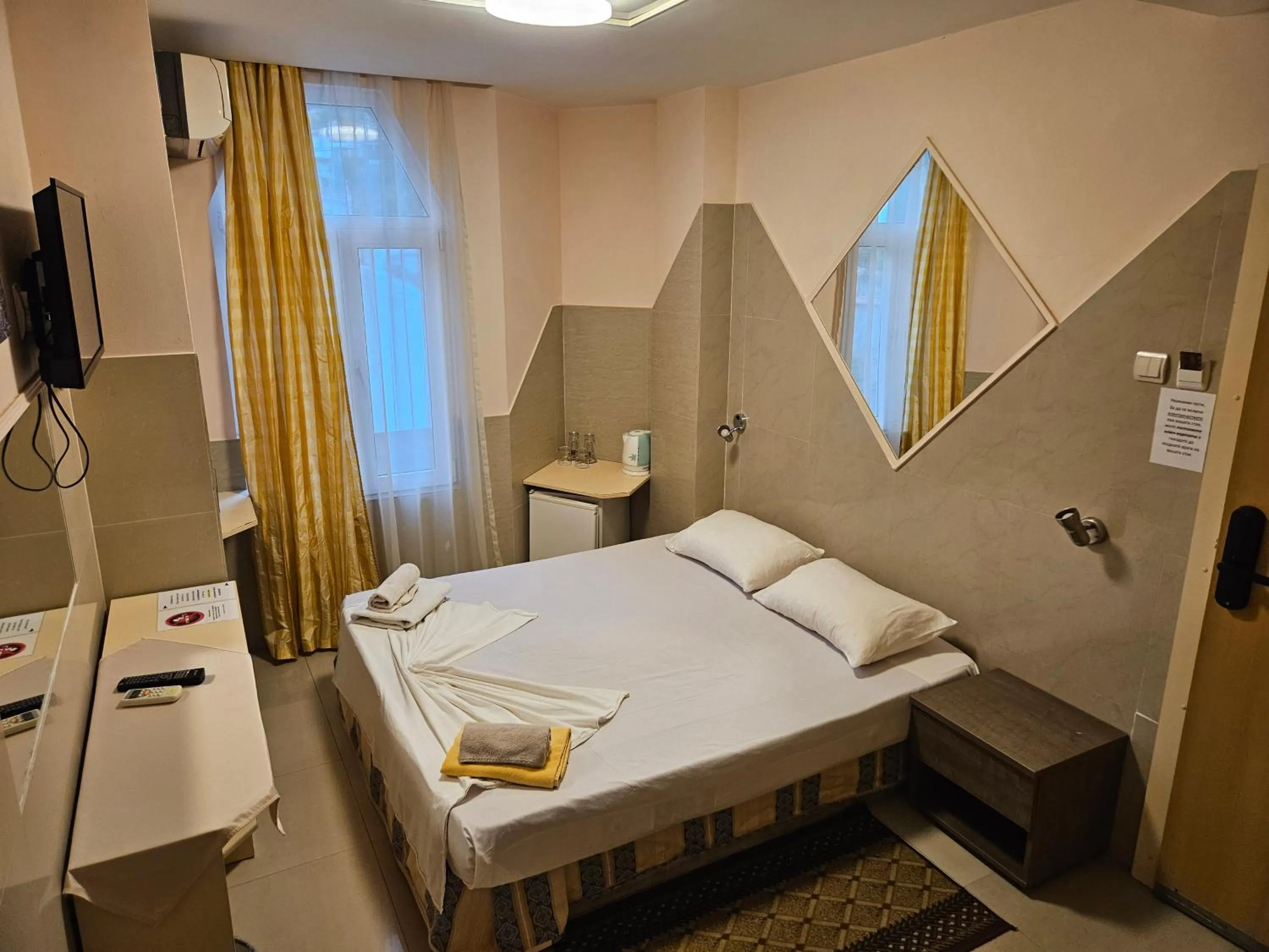 Bed in Paralax Hotel