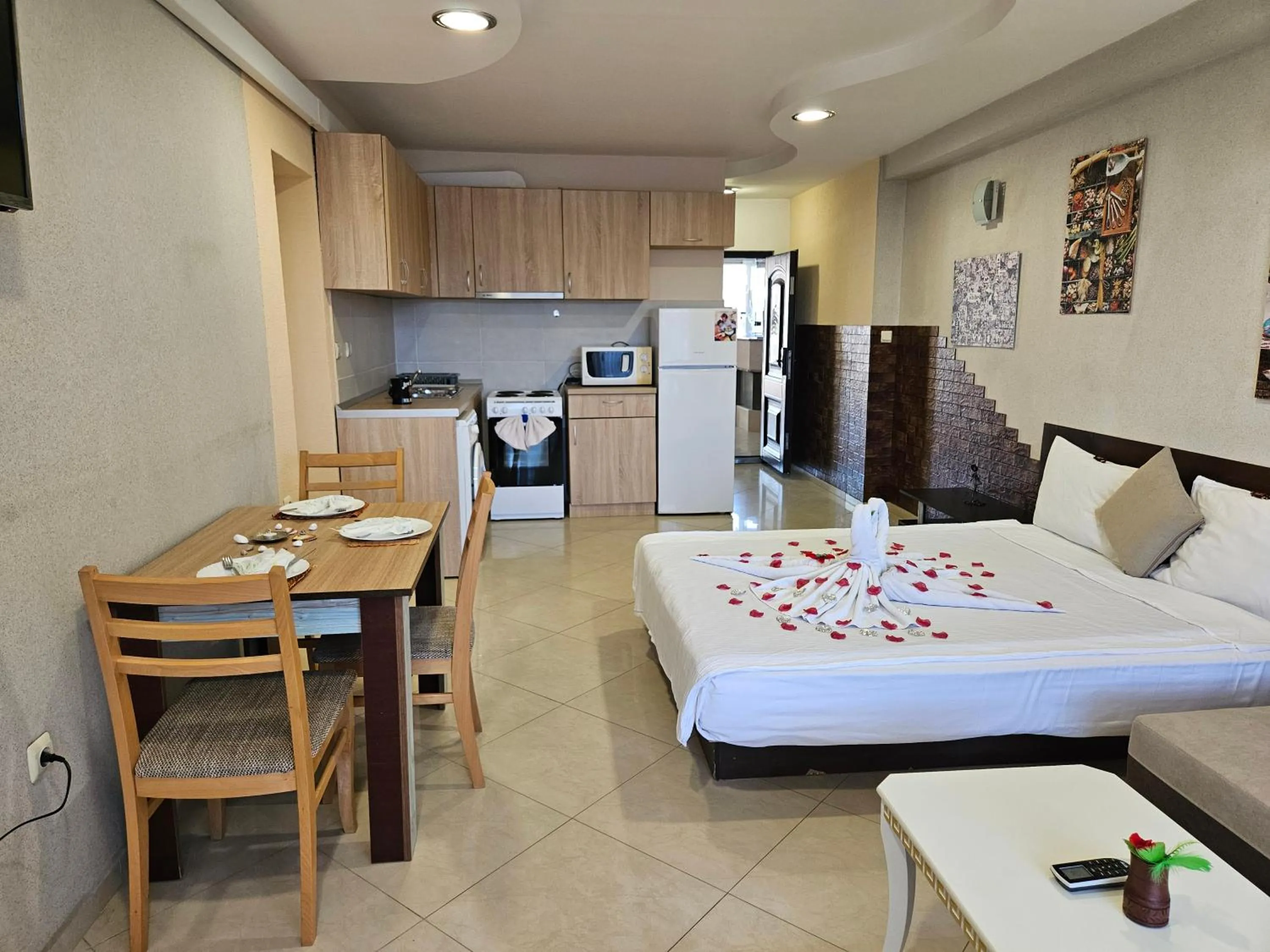 Living room, Bed in Paralax Hotel