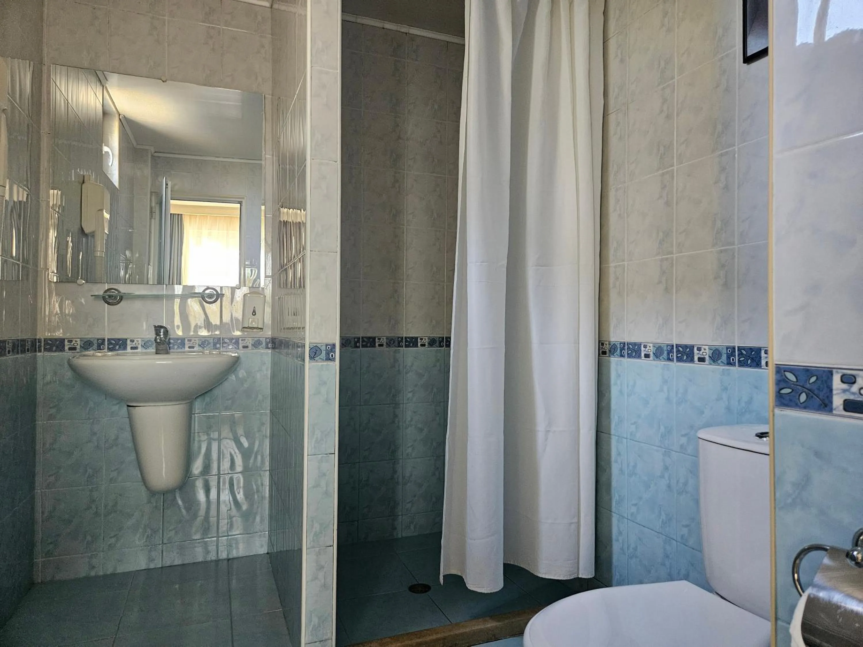 Bathroom in Paralax Hotel